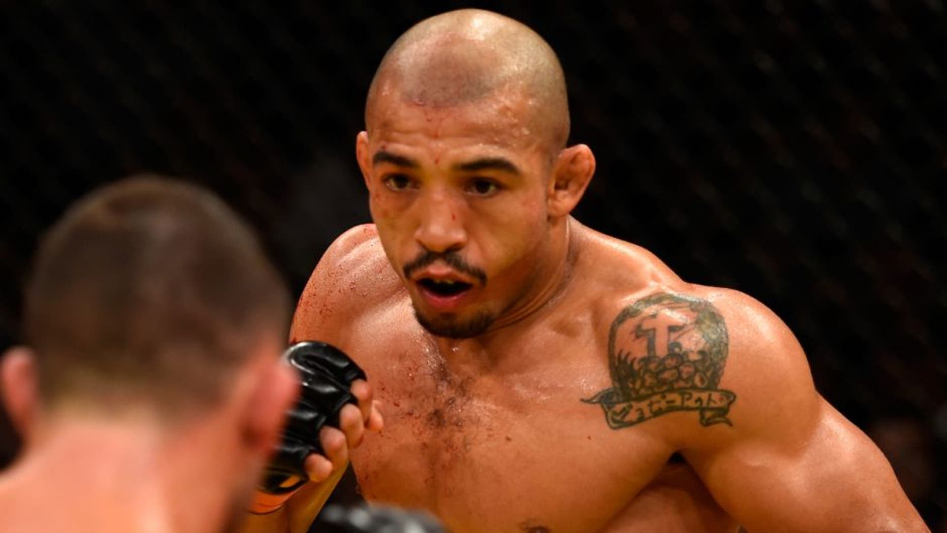 LAS VEGAS, NV - JULY 09: (R-L) Jose Aldo of Brazil faces off against Frankie Edgar in their UFC interim featherweight championship bout during the UFC 200 event on July 9, 2016 at T-Mobile Arena in Las Vegas, Nevada. (Photo by Josh Hedges/Zuffa LLC/Zuffa LLC via Getty Images)