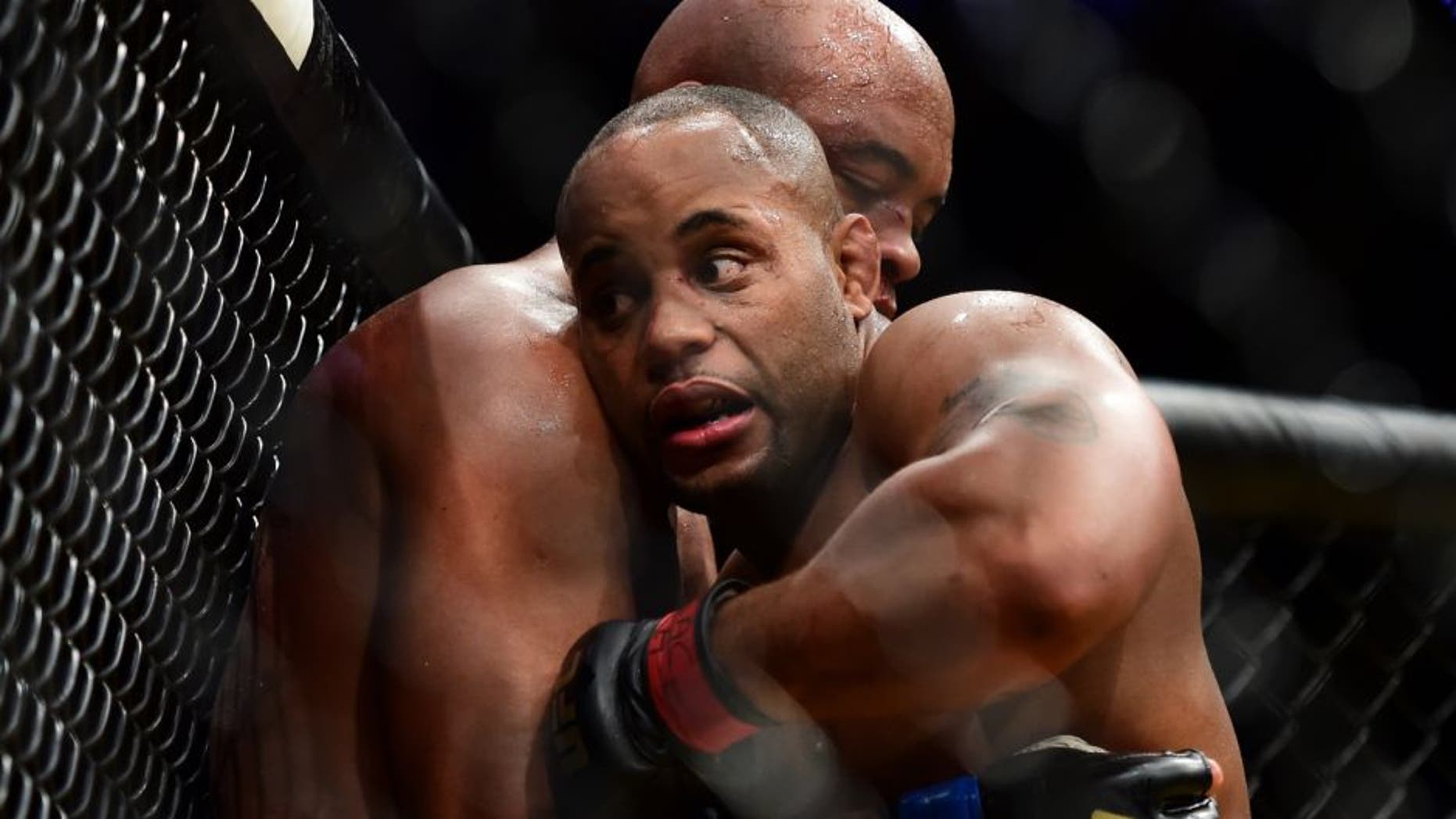 LAS VEGAS, NV - JULY 09: (R-L) Daniel Cormier wrestles with Anderson Silva of Brazil in their light heavyweight bout during the UFC 200 event on July 9, 2016 at T-Mobile Arena in Las Vegas, Nevada. (Photo by Harry How/Zuffa LLC/Zuffa LLC via Getty Images)