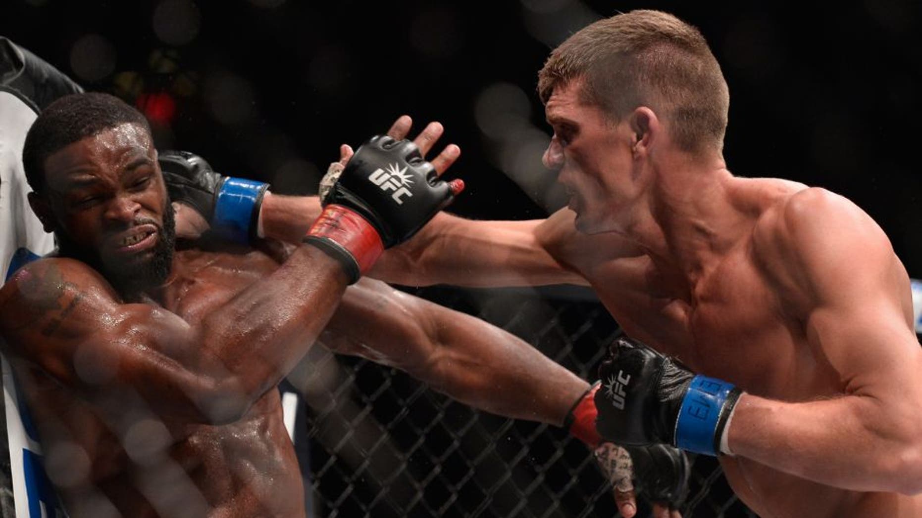 NEW YORK, NY - NOVEMBER 12: (R-L) Stephen Thompson punches Tyron Woodley in their UFC welterweight championship fight during the UFC 205 event at Madison Square Garden on November 12, 2016 in New York City. (Photo by Brandon Magnus/Zuffa LLC/Zuffa LLC via Getty Images)