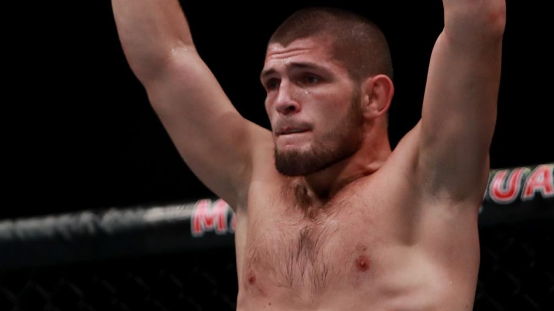 NEW YORK, NY - NOVEMBER 12: Khabib Nurmagomedov of Russia reacts against Michael Johnson of the United States in their lightweight bout during the UFC 205 event at Madison Square Garden on November 12, 2016 in New York City. (Photo by Michael Reaves/Getty Images )