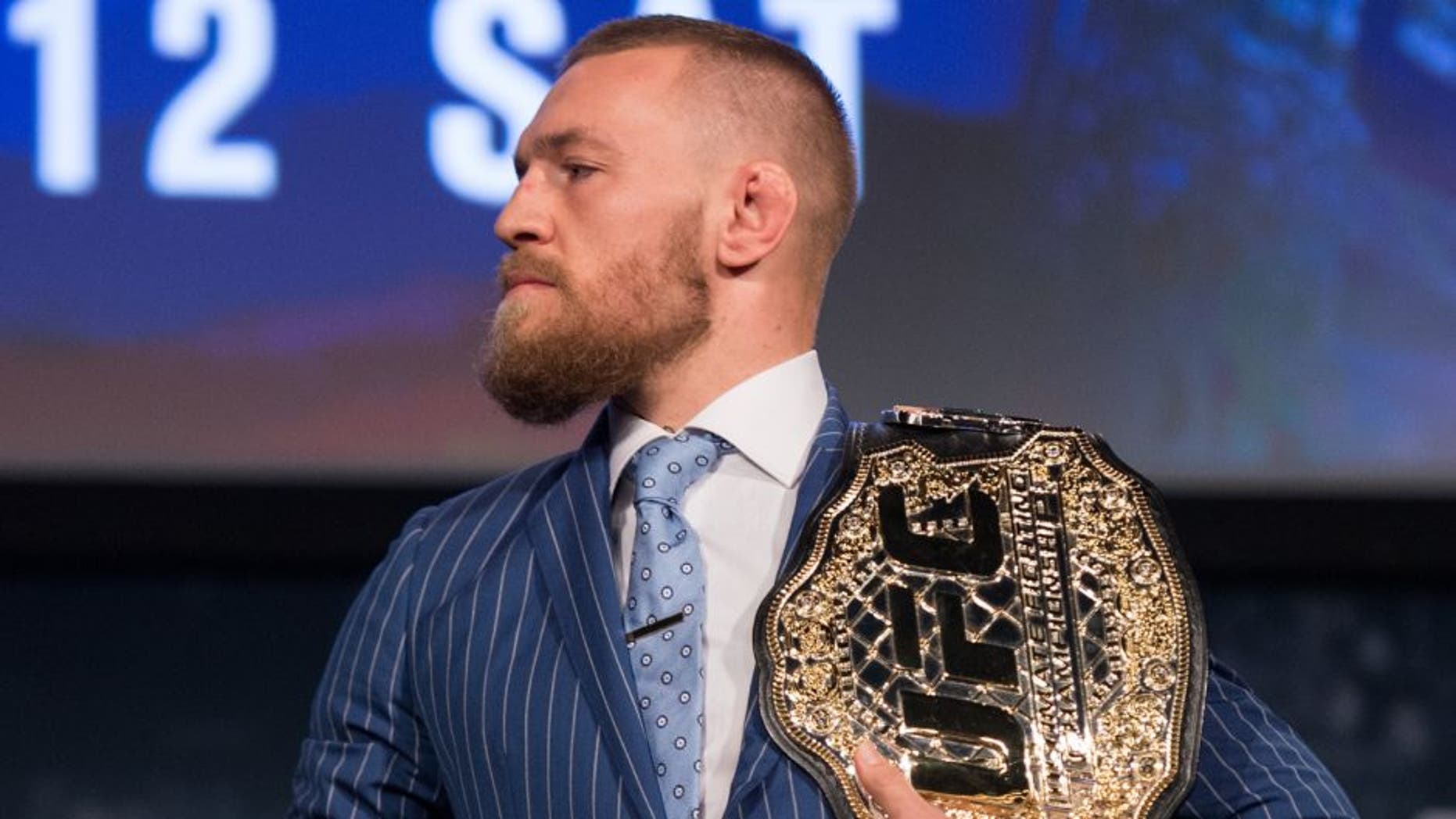 NEW YORK, NY - SEPTEMBER 27: UFC featherweight champion Conor McGregor stares at UFC lightweight champion Eddie Alvarez during the UFC 205 press event at Madison Square Garden on September 27, 2016 in New York City. (Photo by Brandon Magnus/Zuffa LLC/Zuffa LLC via Getty Images)