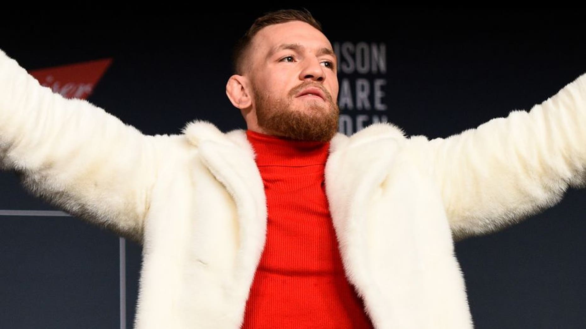 NEW YORK, NY - NOVEMBER 10: UFC featherweight champion Conor McGregor of Ireland interacts with fans and media during the UFC 205 press conference inside The Theater at Madison Square Garden on November 10, 2016 in New York City. (Photo by Jeff Bottari/Zuffa LLC/Zuffa LLC via Getty Images)