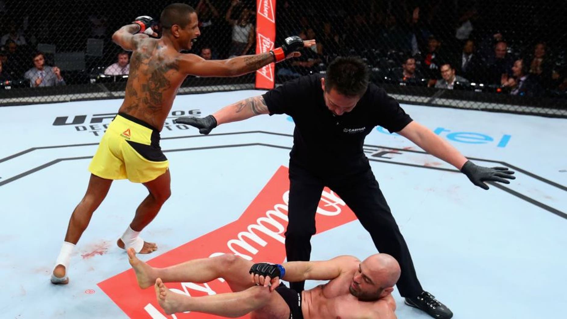 SAO PAULO, BRAZIL - NOVEMBER 19: Johnny Eduardo of Brazil celebrates victory against Many Gamburyan of Armenia after their bantamweight bout at the UFC Fight Night Bader v Minotouro at Ibirapuera Gymnasium on November 19, 2016 in Sao Paulo, Brazil. (Photo by Buda Mendes/Zuffa LLC/Zuffa LLC via Getty Images)