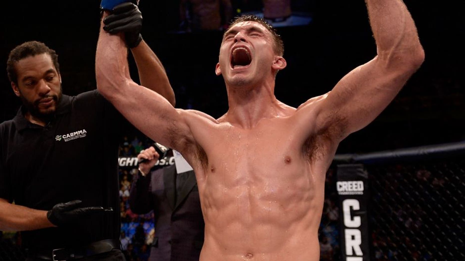 SAO PAULO, BRAZIL - NOVEMBER 07: Johnny Case of the United States celebrates victory over Yan Cabral of Brazil in their lightweight bout during the UFC Fight Night Belfort v Henderson at Ibirapuera Gymnasium on November 7, 2015 in Sao Paulo, Brazil. (Photo by Buda Mendes/Zuffa LLC/Zuffa LLC via Getty Images)
