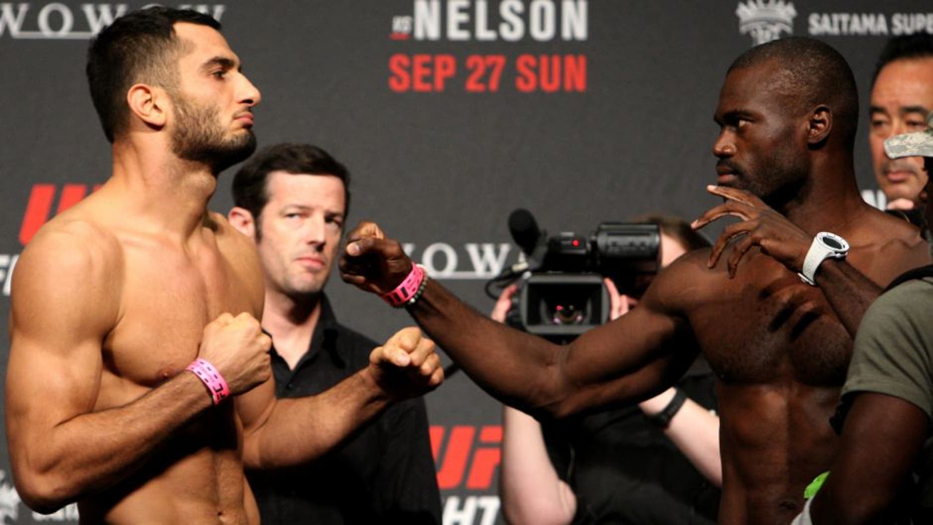 SAITAMA, JAPAN - SEPTEMBER 25: (L and R) Gegard Mousasi and Uriah Hall during the UFC weigh-in at the Saitama Super Arena on September 25, 2015 in Saitama, Japan. (Photo by Mitch Viquez/Zuffa LLC/Zuffa LLC via Getty Images)
