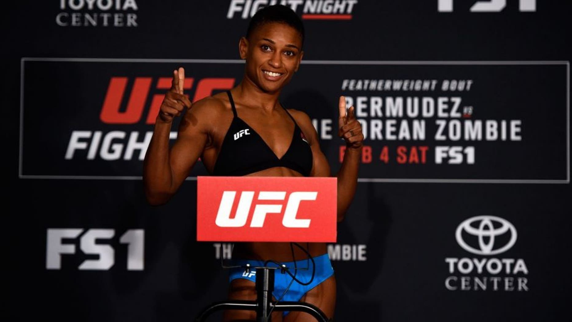 HOUSTON, TEXAS - FEBRUARY 03: Angela Hill poses on the scale during the UFC Fight Night weigh-in at the Sheraton North Houston at George Bush Intercontinental on February 3, 2017 in Houston, Texas. (Photo by Jeff Bottari/Zuffa LLC/Zuffa LLC via Getty Images)