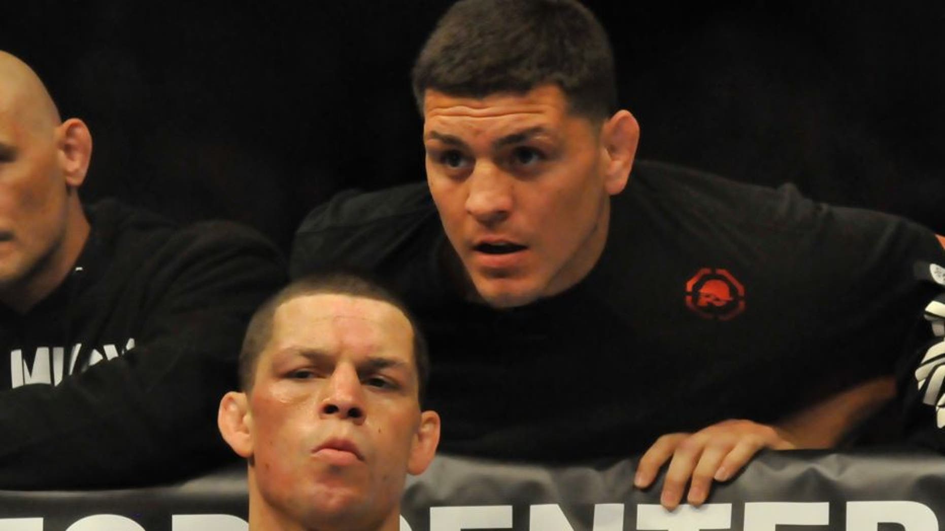 EAST RUTHERFORD, NEW JERSEY - MAY 5, 2012: Nate Diaz receives last second advice from his brother Nick Diaz in his corner before a lightweight bout at Izod Center on May 5, 2012 in East Rutherford, New Jersey. (Photo by David Dermer/Diamond Images/Getty Images)