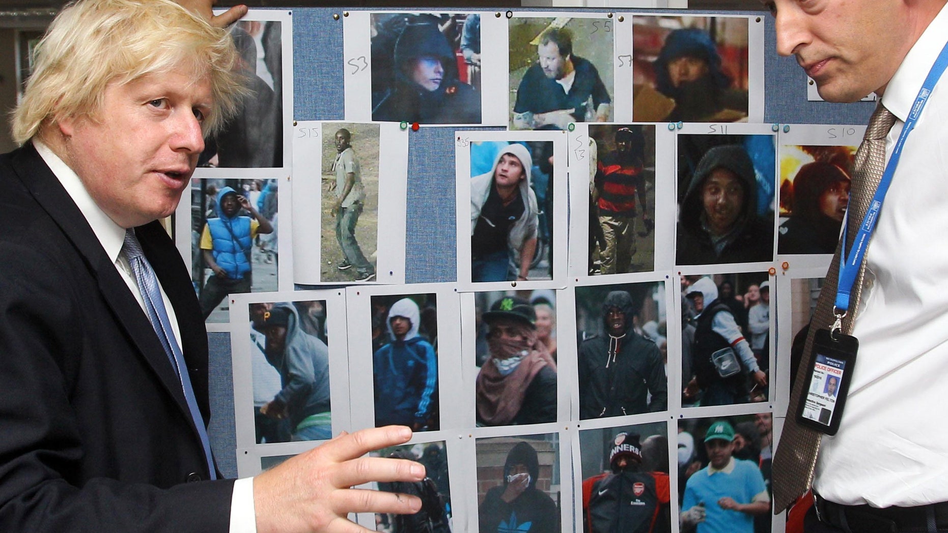 Aug. 15: London Mayor Boris Johnson visits a Police CCTV Investigation Unit in London, that is gathering evidence of the London riots. Britain must confront a culture of laziness, irresponsibility and selfishness which fueled four days of riots that left five dead, thousands facing criminal charges and hundreds of millions of pounds (dollars) of damage, Prime Minister David Cameron acknowledged Monday.