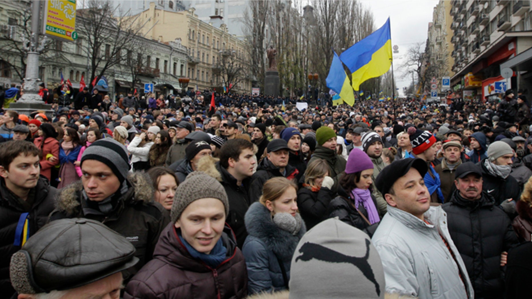 Dec. 1, 2013: Ukrainian protesters crowd a boulevard as they march to Independence square in downtown Kiev, Ukraine.