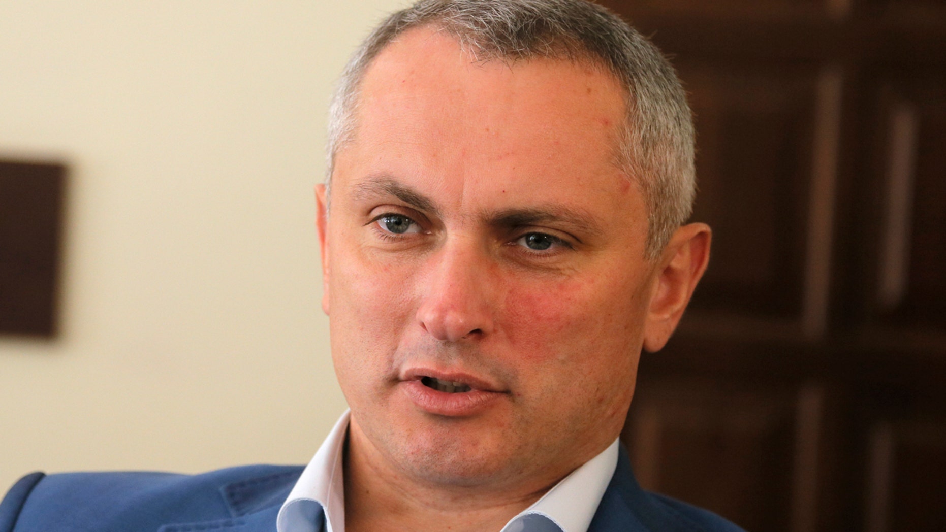 Col. Serhiy Demydiuk, the head of Ukraine's national CyberPolice unit talks during an interview with the Associated Press in his office in Kiev, Ukraine, Monday, July 3, 2017.