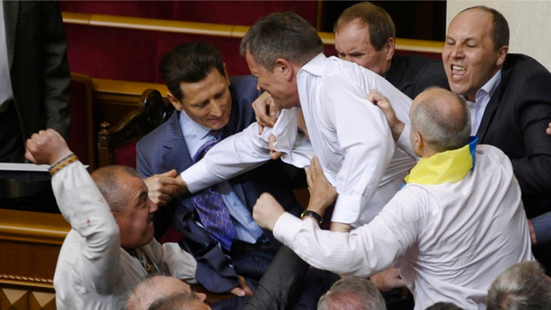May 24, 2012: Lawmakers from pro-presidential and oppositional factions fight in the parliament session hall in Kiev, Ukraine.