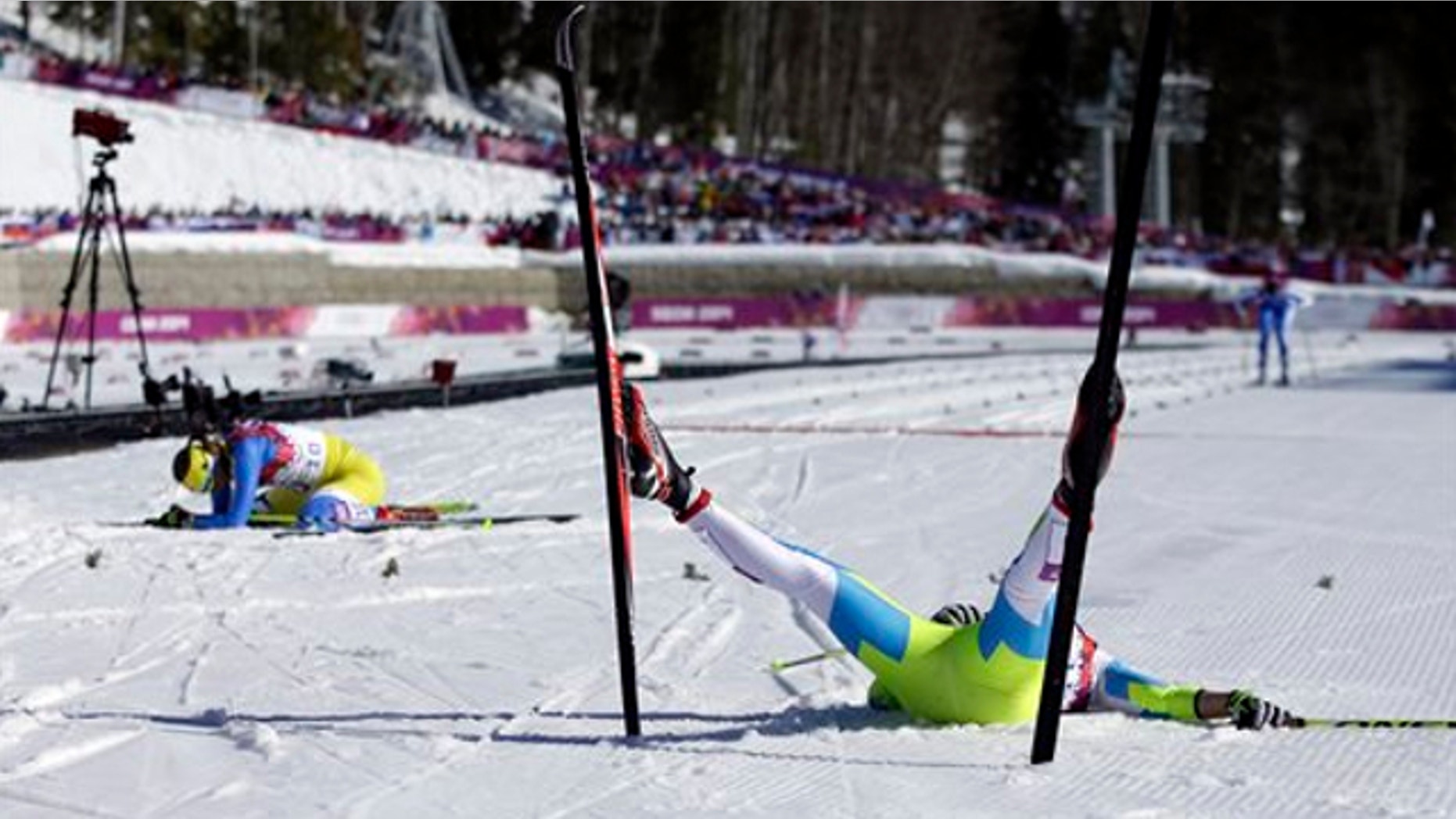 Feb. 13, 2014: Slovenia's Barbara Jezersek, right, and Ukraine's Marina Lisogor lie on the snow after completing the women's 10K classical-style cross-country race at the 2014 Winter Olympics in Krasnaya Polyana, Russia.