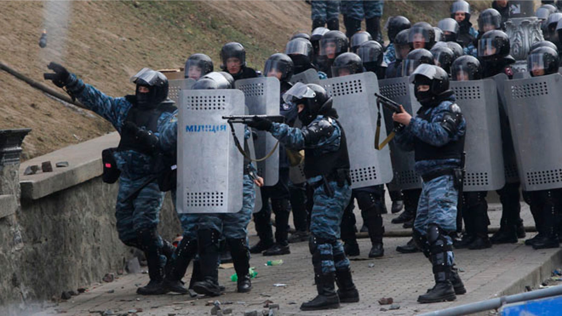 Jan. 20, 2014: Riot police officers shoot rubber bullets and throw a stun grenade at anti-government protesters, during unrest in central Kiev, Ukraine.
