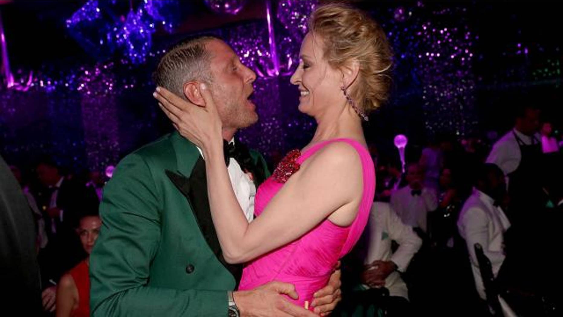Uma Thurman says she felt 'violated' by Fiat heir Lapo Elkann's kiss at a charity gala.