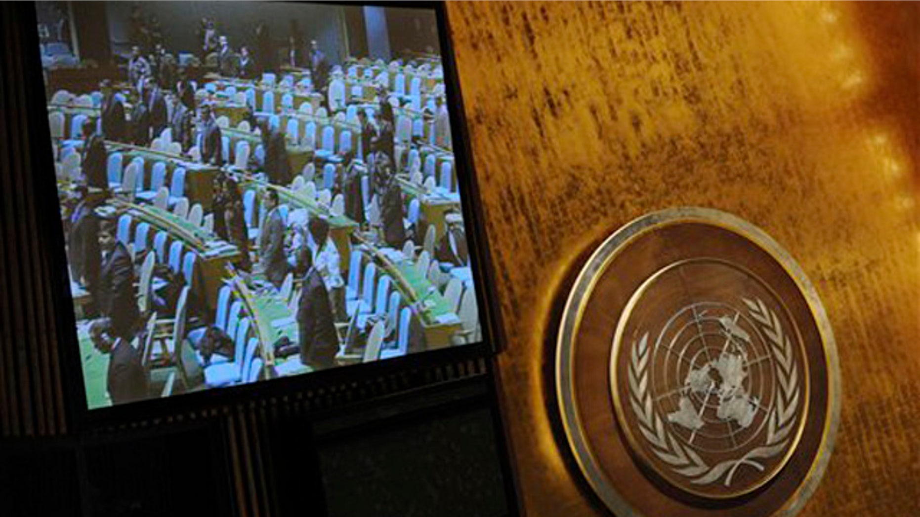 Dec. 22, 2011: In this photo released by China's Xinhua News Agency, the U.N. General Assembly observes a moment of silence to mourn the death of North Korean leader Kim Jong Il at the U.N. Headquarters in New York.