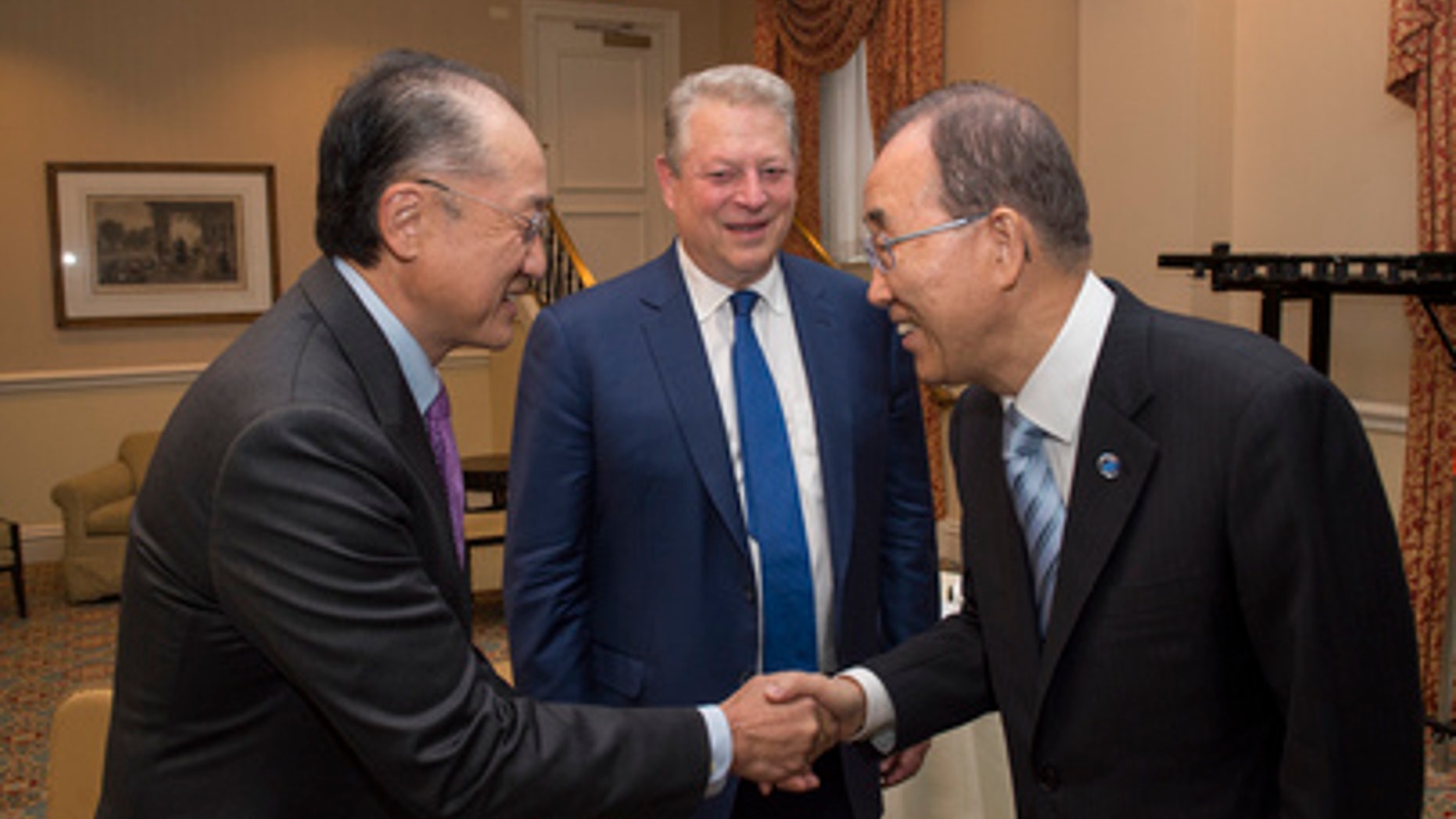UN Secretary General Ban Ki-moon (right) greets Jim Yong Kim, President of the World Bank Group, as Al Gore, former vice president of the United States, looks on during welcome reception for the Climate Action 2016 summit on May 5, 2016. (Credit: UN Photo/Eskinder Debebe)