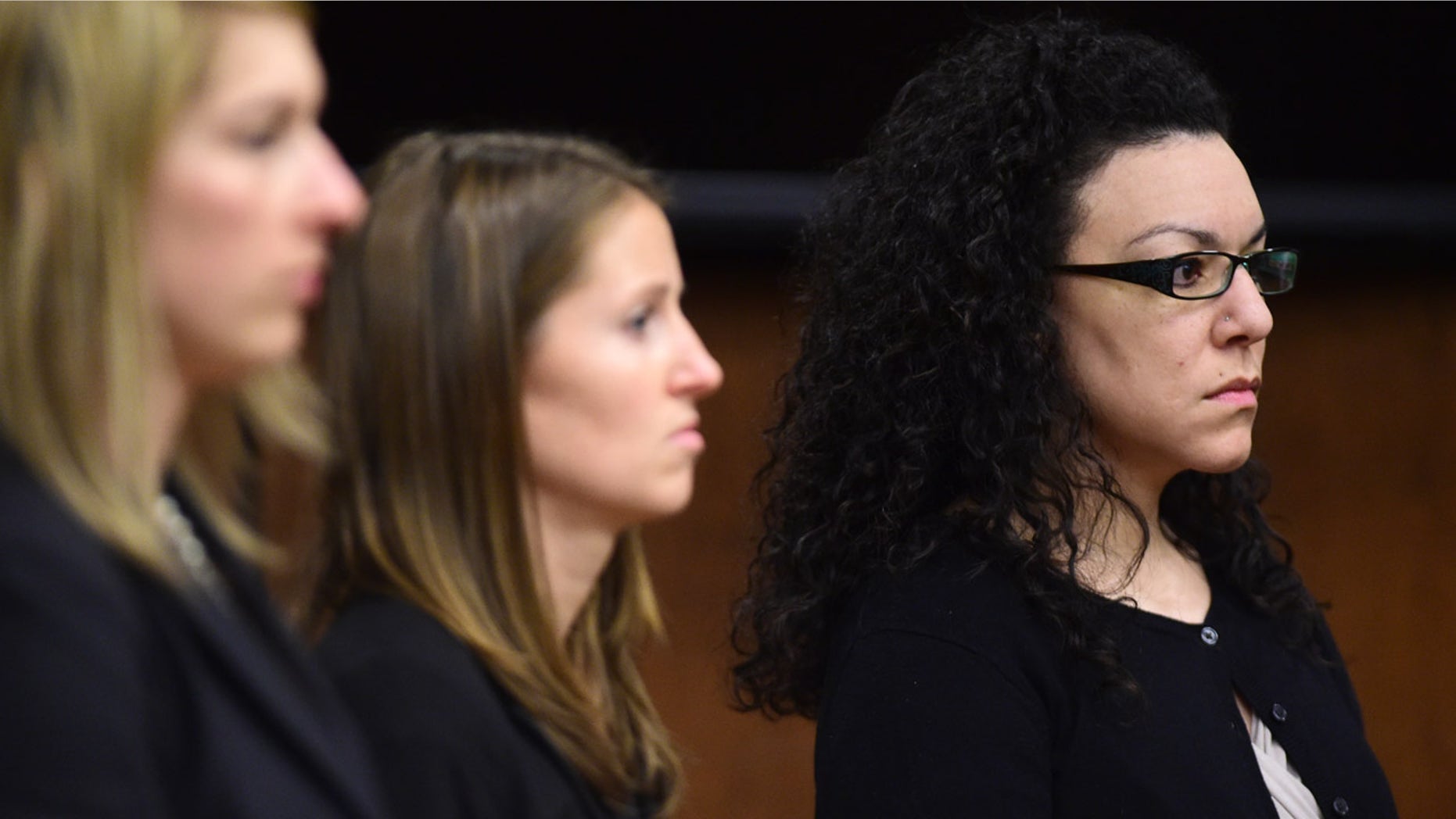 Dynel Lane, far right, was convicted of attempted first-degree murder.