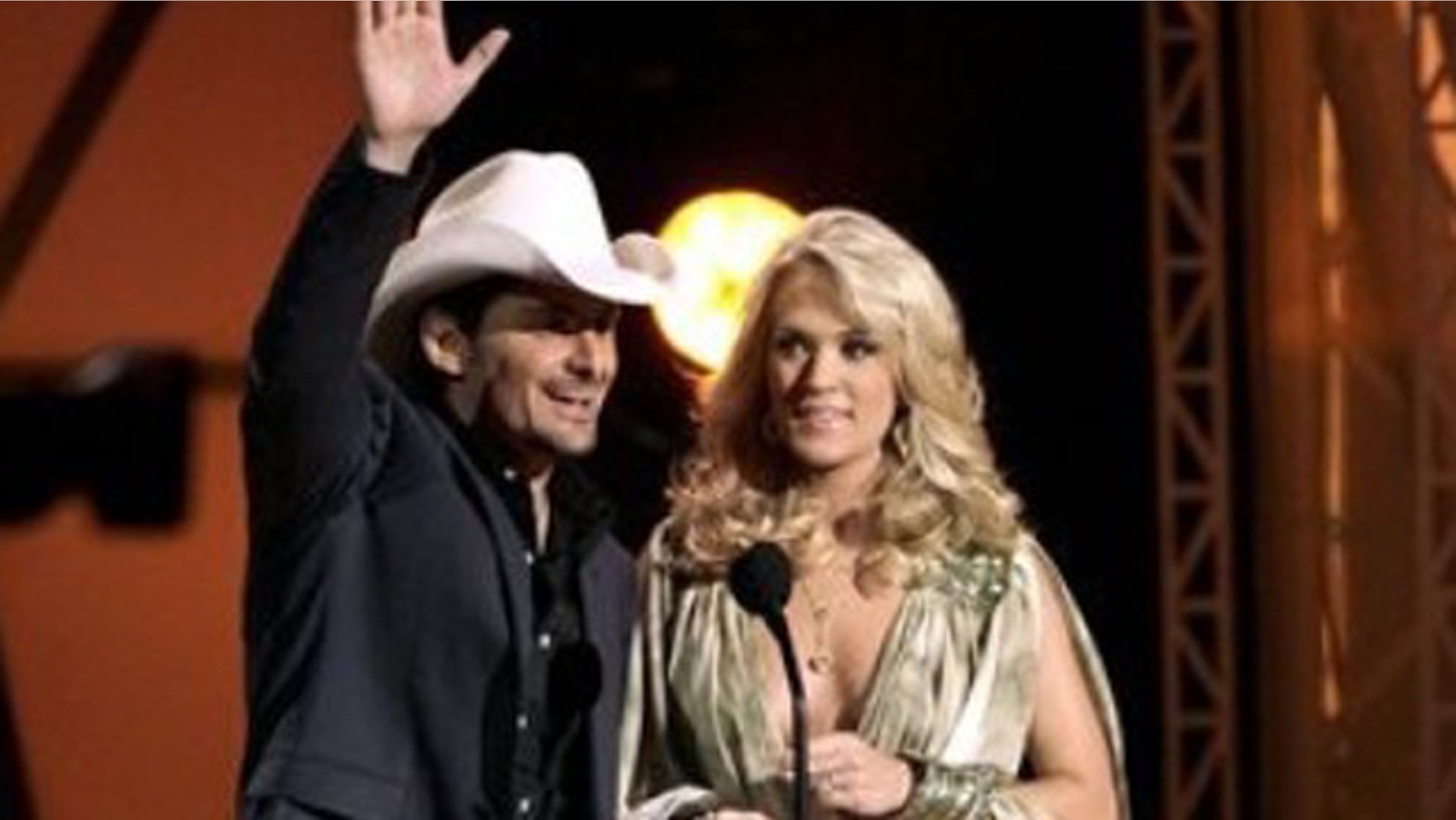 Nov. 9, 2011: Hosts Brad Paisley, left, and Carrie Underwood speak during the 45th Annual CMA Awards in Nashville, Tenn.
