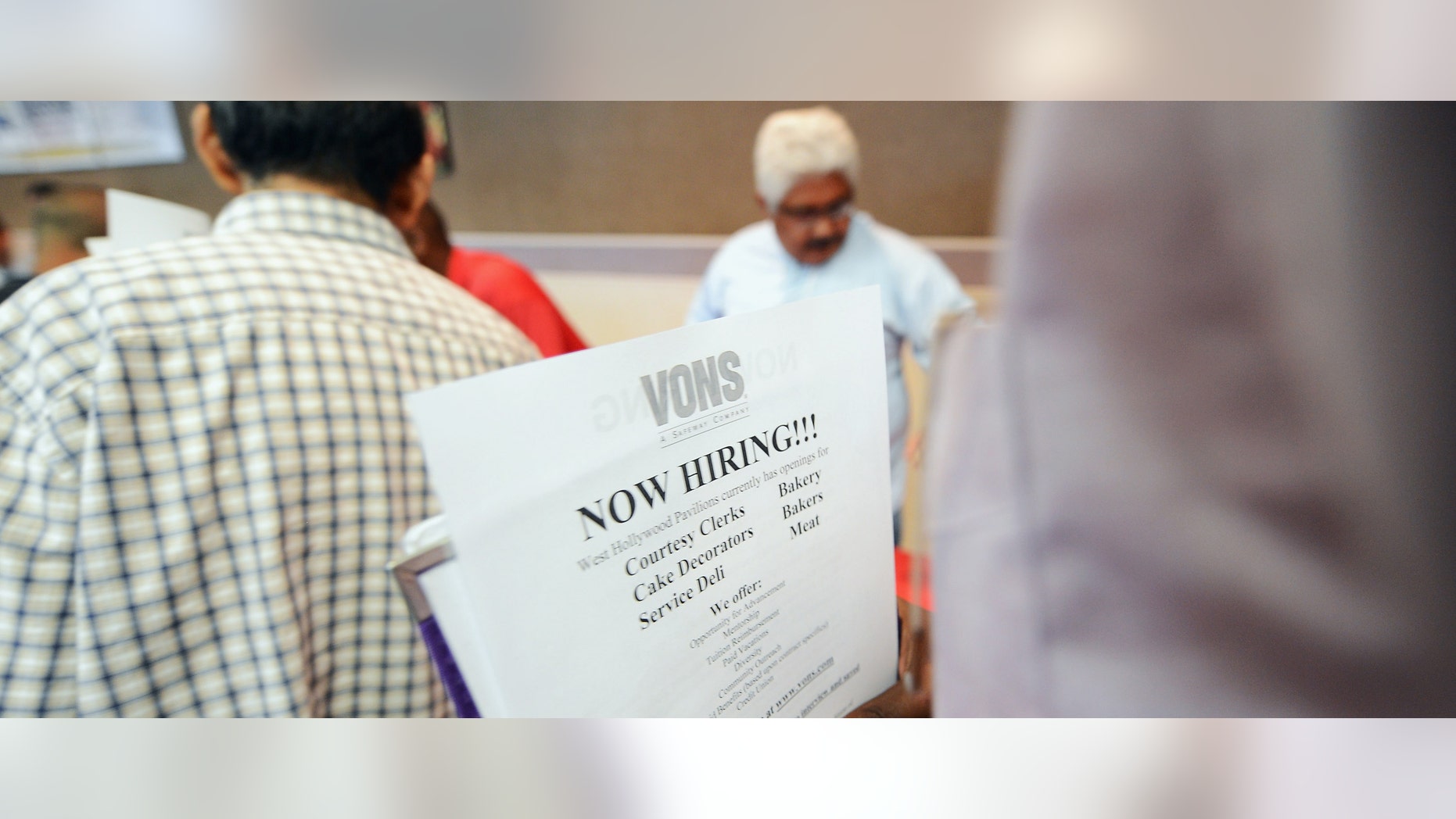 LOS ANGELES, CA - MAY 31: Job seekers line up to pick up job applications during Los Angeles Mission's 11th annual Skid Row Career Fair on May 31, 2012 in Los Angeles, California. According to a Labor Department report, the number of people seeking unemployment benefits rose last week to a five-week high. The same federal government agency said that weekly applications for unemployment aid rose 10,000 to a seasonally adjusted 377,000. (Photo by Kevork Djansezian/Getty Images)