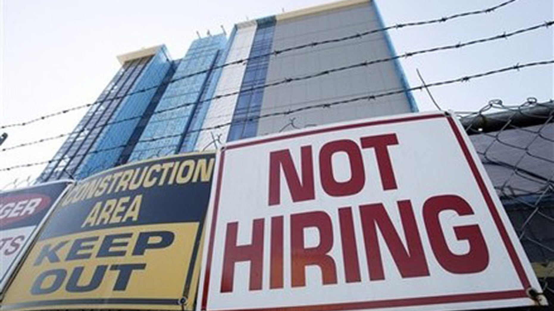 Thursday: A sign turning away potential job-seekers outside a construction site in New Orleans. Employers added the most jobs in five months in October, but the unemployment rate remained at 9.6 percent and the construction industry posted no notable gains.