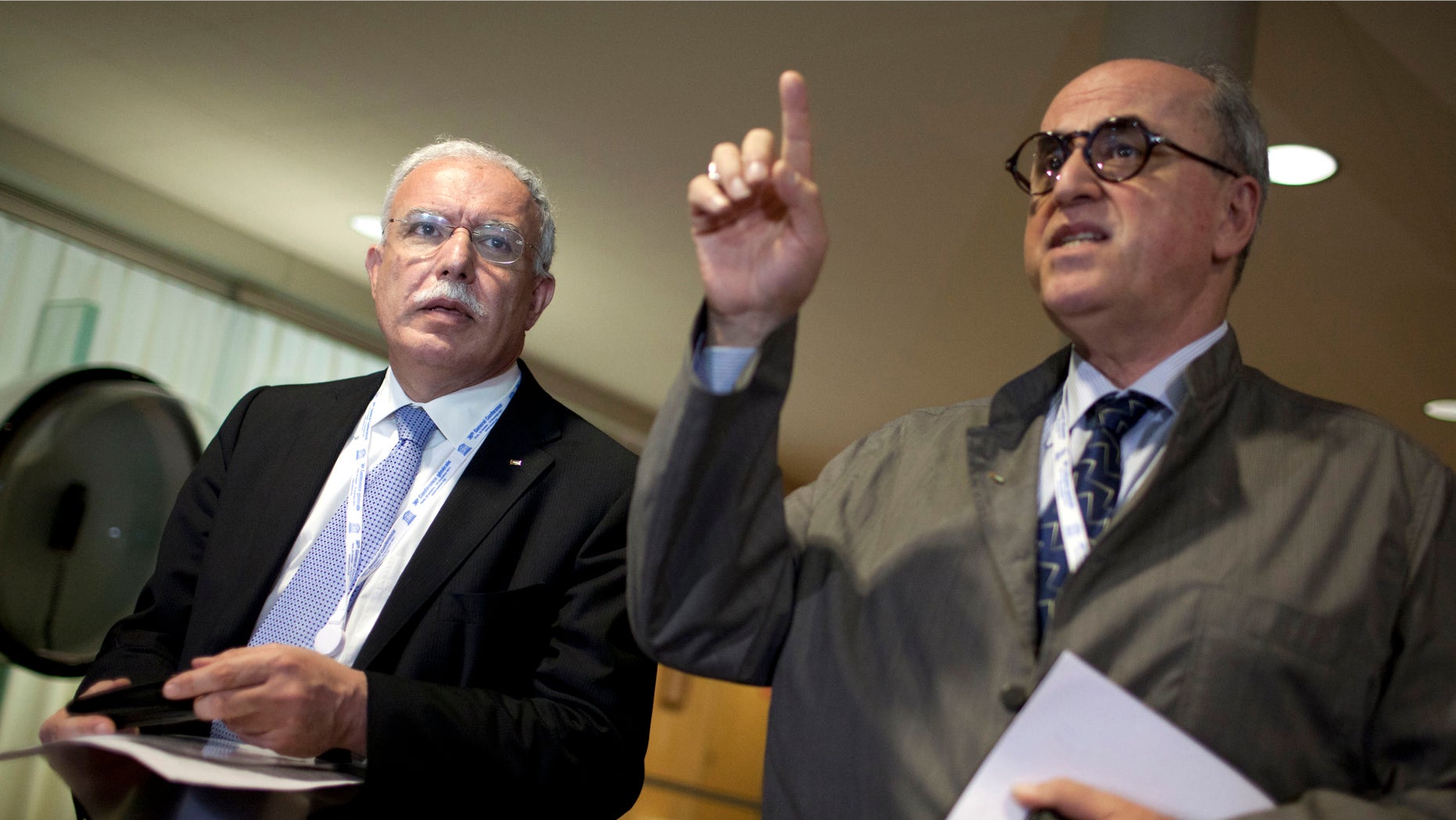 Oct. 31, 2011: Palestinian Foreign Minister Riad al-Maliki, left, is seen with historian and Ambassador for Palestine at UNESCO Elias Sanbar, left, during a session of UNESCO's 36th General Conference, in Paris.