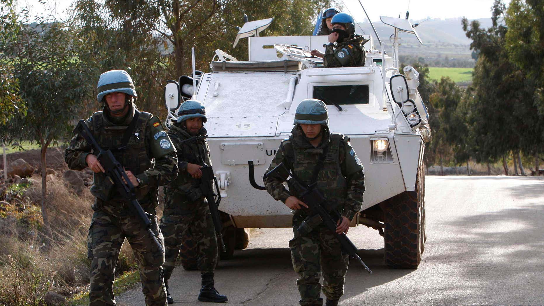 Jan. 14, 2009: Spanish U.N peacekeepers patrol the area where a rocket fell short in Lebanon several kilometers north of the Israeli border, near the village of el-Meri, southern Lebanon. Russia's aggressiveness in the east.