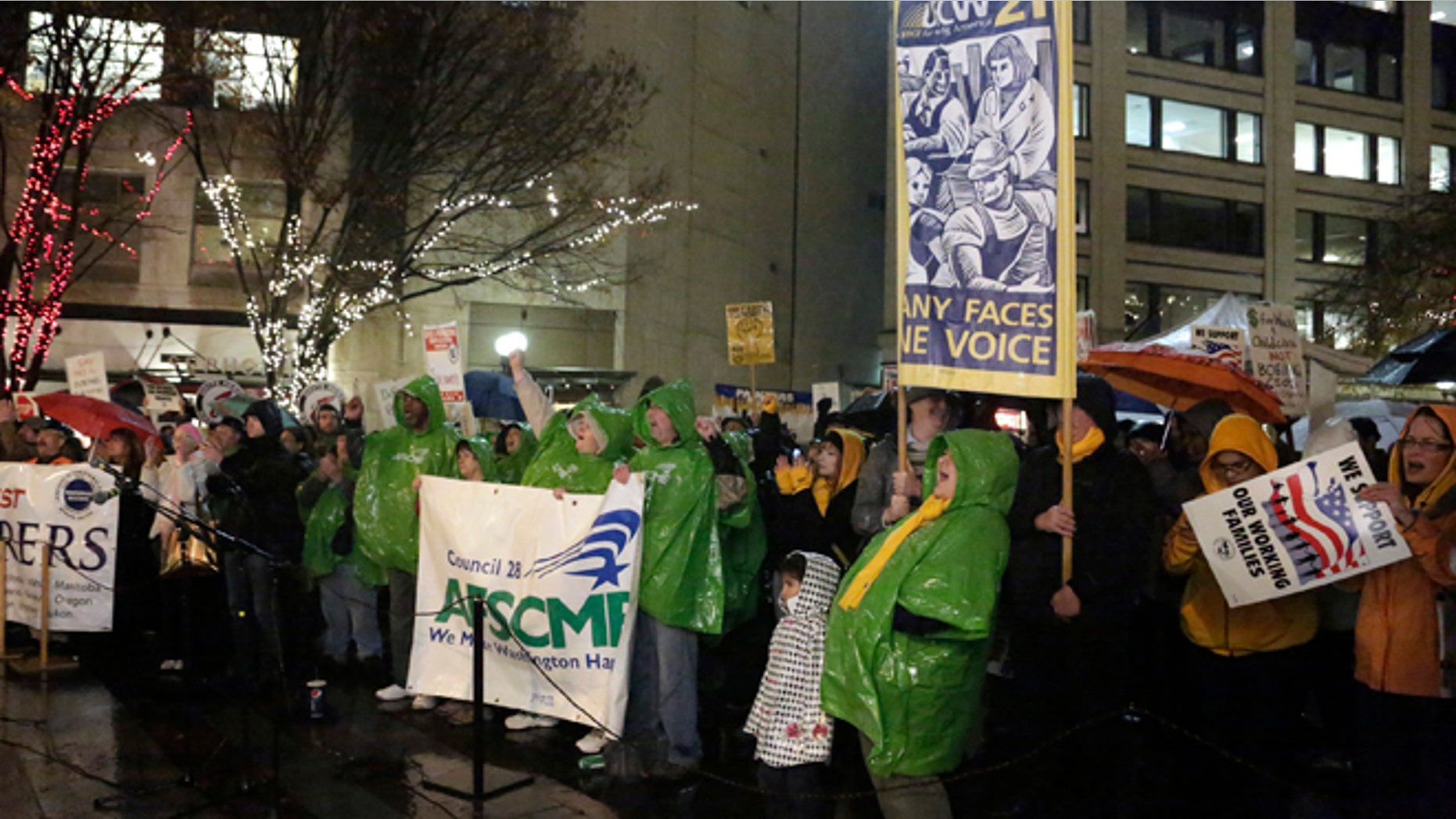 FILE: Nov. 18, 2013: A rally to show support for a machinists union, in Seattle, Wash.