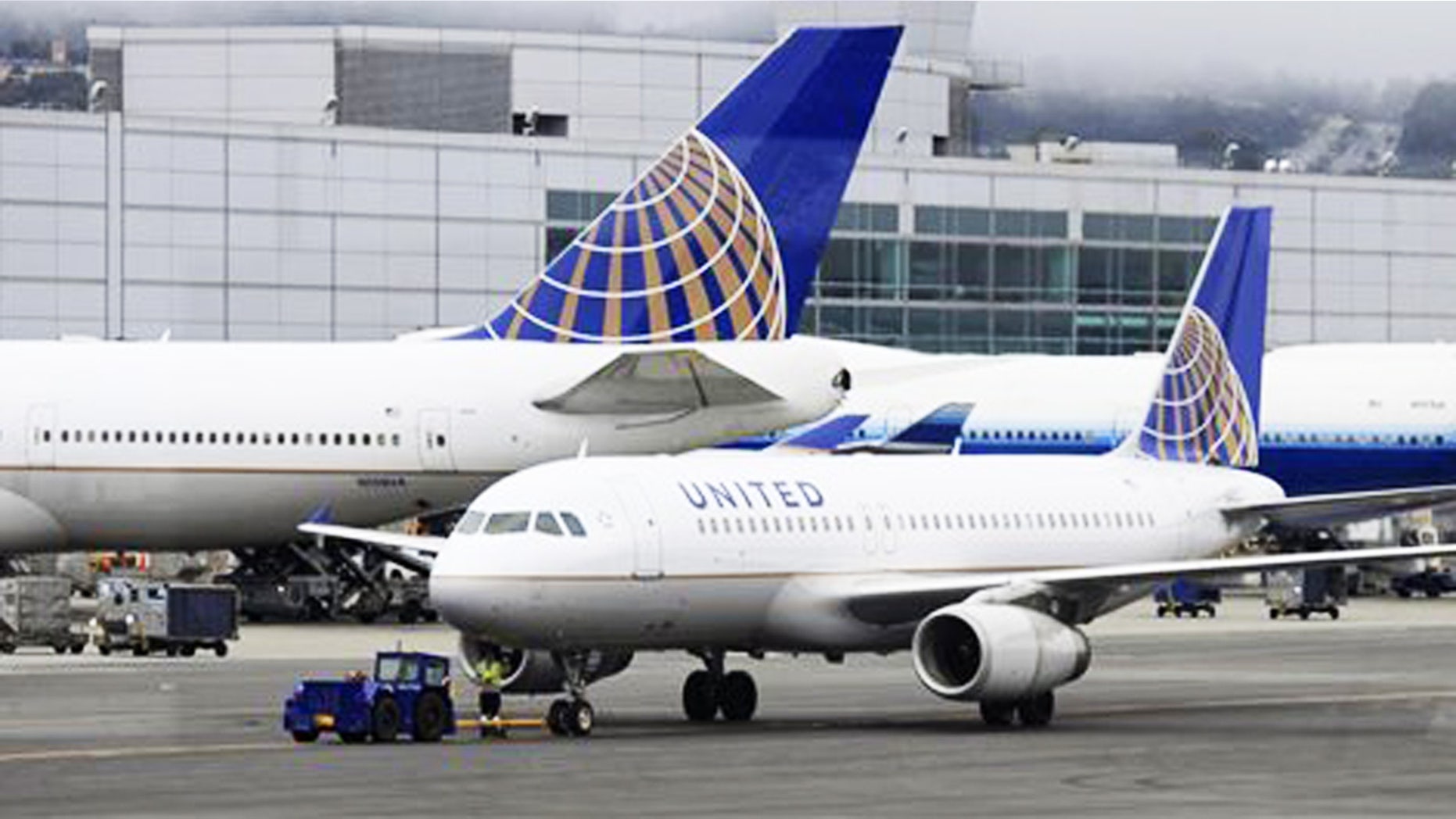 United has fired an employee who deployed an emergency slide.