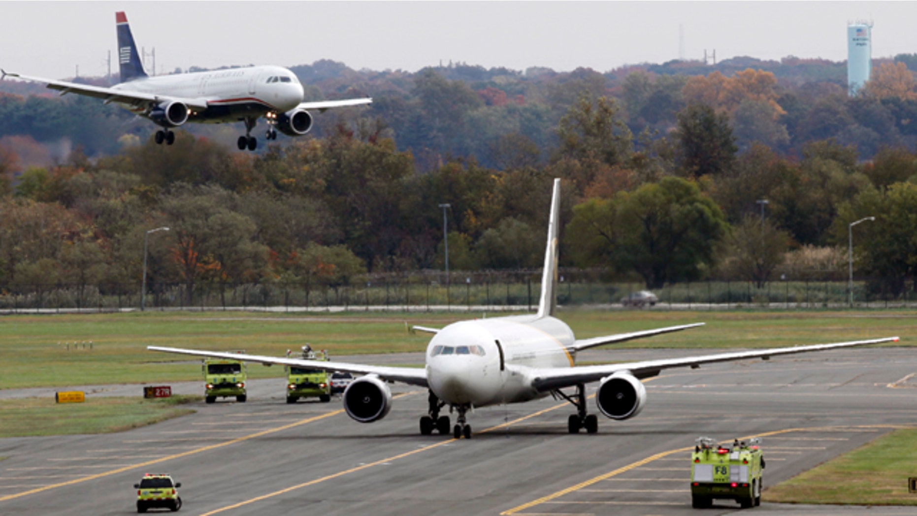 Oct. 29: A United Parcel Service jet is seen isolated on a runway at Philadelphia International Airport. Law enforcement officials are investigating reports of suspicious packages on cargo planes in Philadelphia and Newark, N.J.
