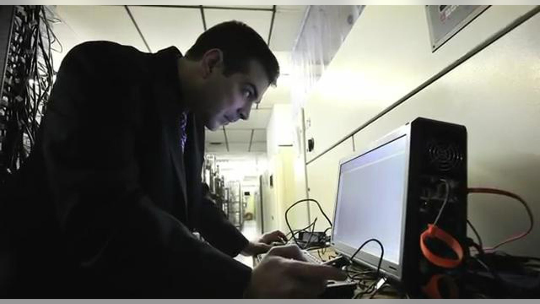 March 23, 2012: Digital forensic examiner Ashim Kapur disables a computer running the Zeus botnet in Scranton, PA.