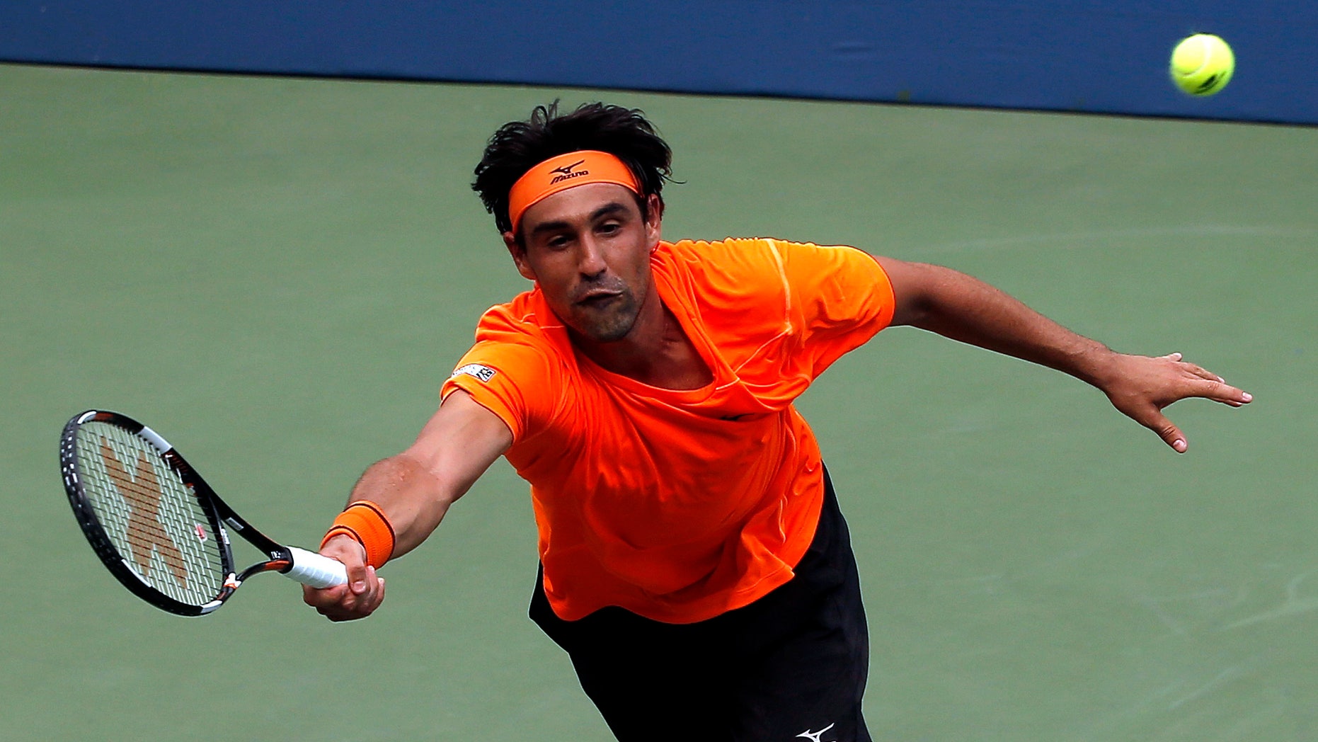 Marcos Baghdatis returns a shot at the U.S. Open.