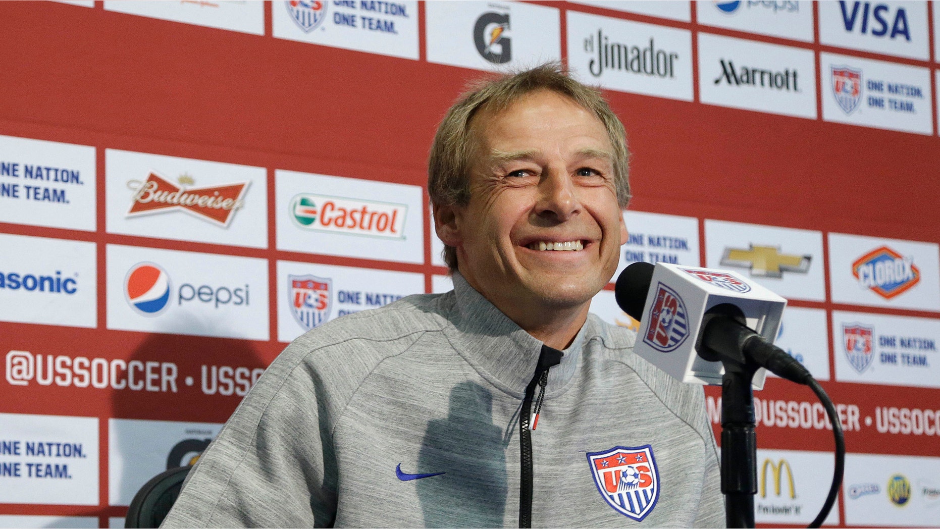 United States soccer coach Jurgen Klinsmann speaks at a news conference for the World Cup soccer tournament in Stanford, Calif., Friday, May 23, 2014. (AP Photo/Jeff Chiu)