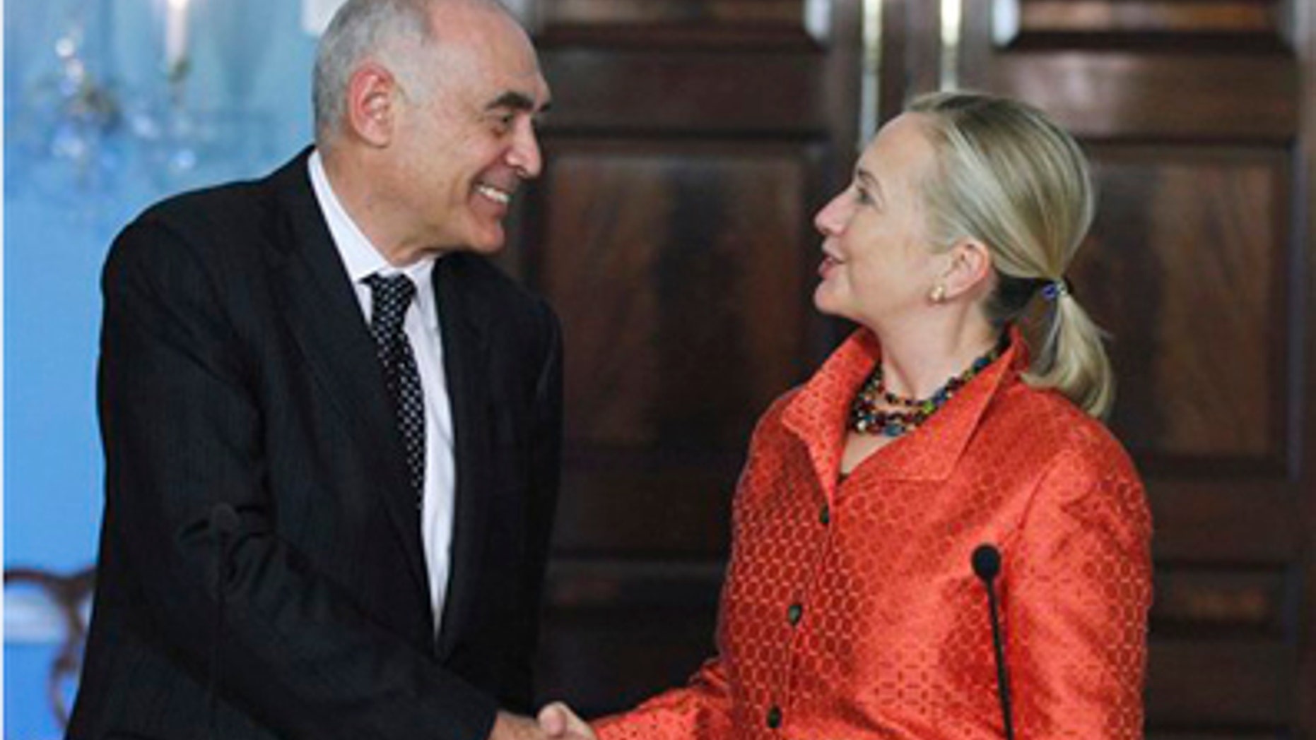 Sept. 28: Secretary of State Hillary Rodham Clinton shakes hands with Egyptian Foreign Affairs Minister Mohamed Kamel Amr during a joint news conference following a bilateral meeting at the State Department in Washington.