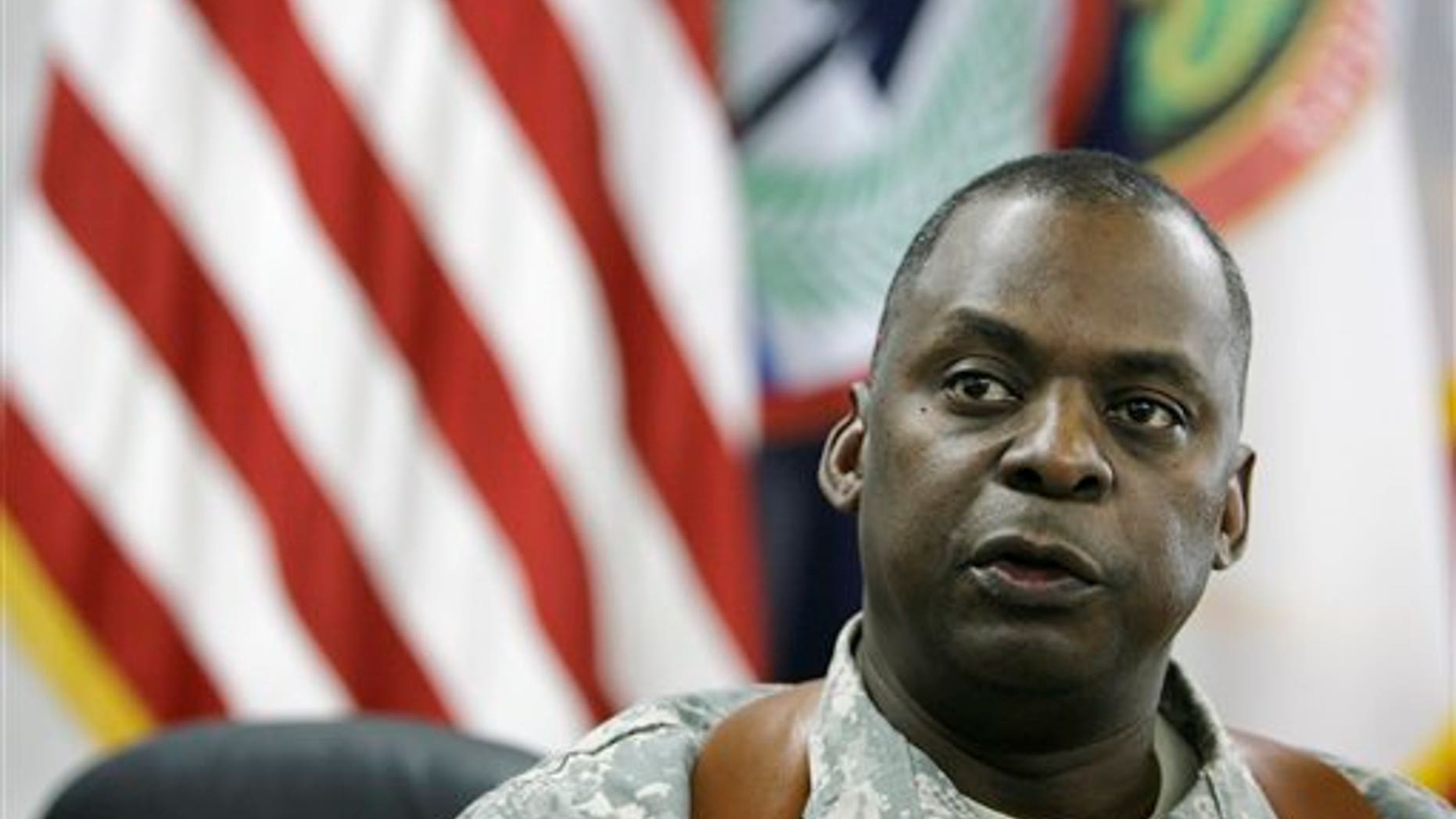 In a Thursday, May 22, 2008 file photo, Gen. Lloyd Austin talks during an interview to the Associated Press in Baghdad, Iraq. The top American general in Iraq said Monday Nov. 21, 2011 the country will face some "turbulence" after American forces leave.