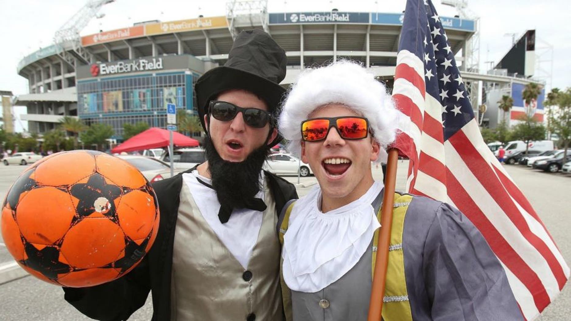 Fans get ready in the parking lot before the Unites States plays host to Nigeria in a friendly at EverBank Field in Jacksonville, Fla., on Saturday, June 7, 2014. (Stephen M. Dowell/Orlando Sentinel/MCT)