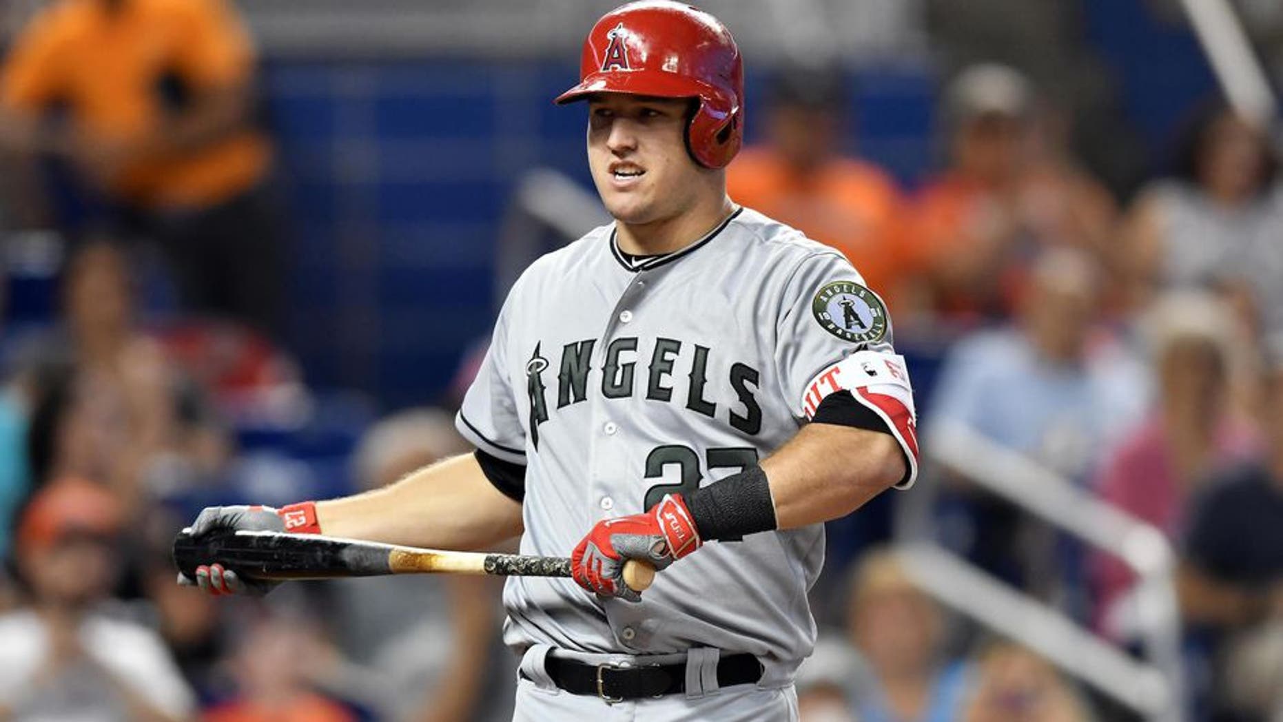 May 28, 2017; Miami, FL, USA; Los Angeles Angels center fielder Mike Trout (27) looks over at MLB home plate umpire Tom Woodring (not pictured) during the third inning against the Miami Marlins at Marlins Park. Mandatory Credit: Steve Mitchell-USA TODAY Sports