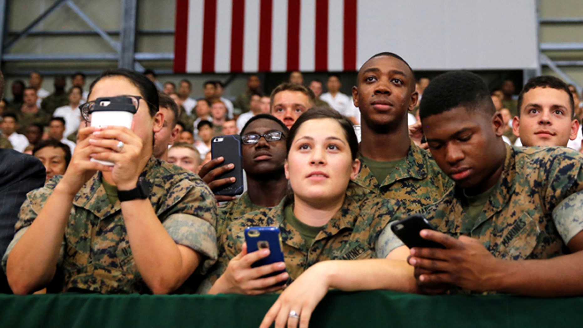 May 27, 2016: U.S. and Japan Self-Defence Force's soldiers listen to a speech by President Obama during his visit at Iwakuni Marine Corps Air Station, Japan. (Reuters)