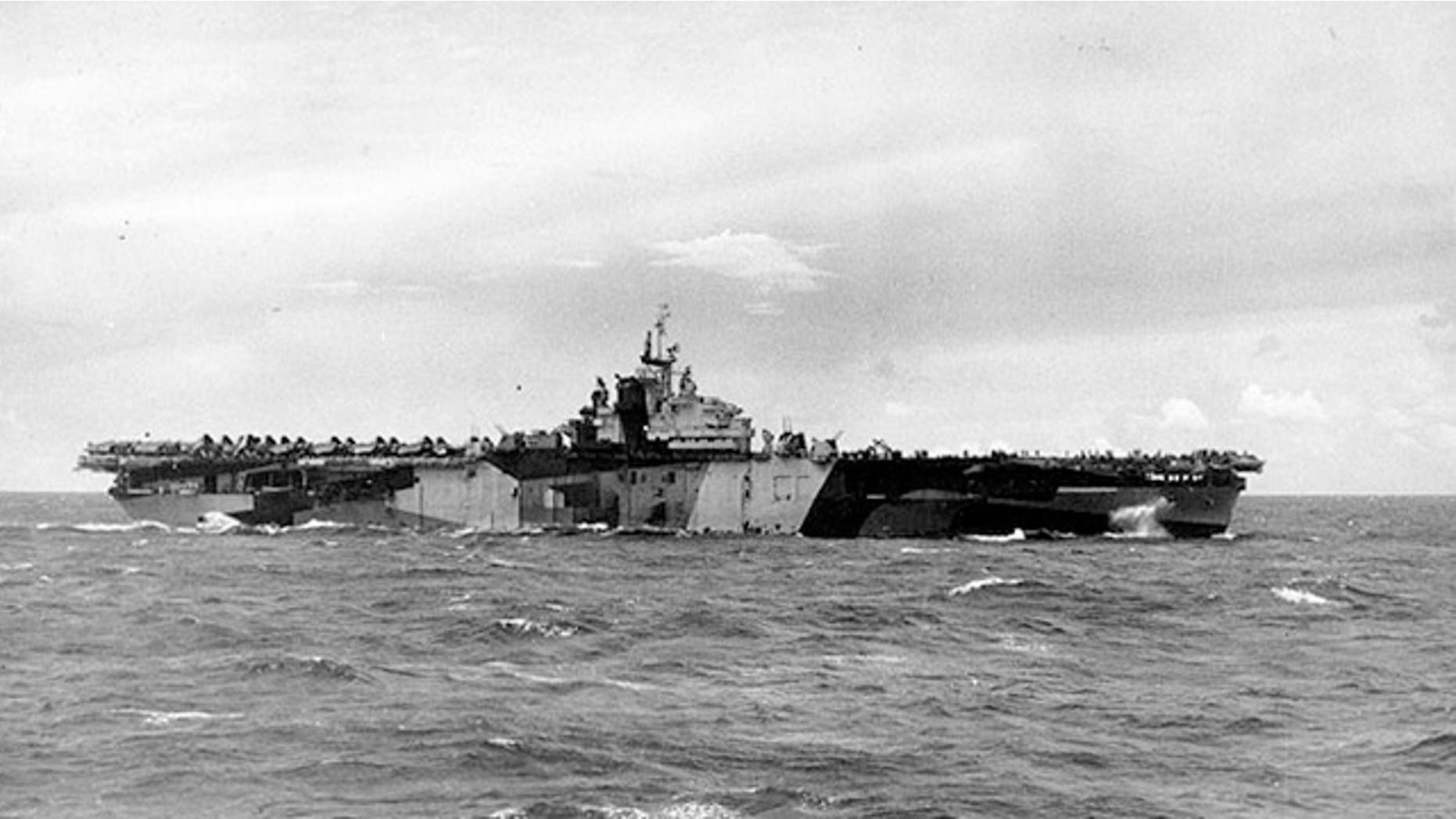 Aug. 1, 1944:The USS Franklin, pictured here painted in camouflage, was badly damaged in a Japanese attack in March 1945.