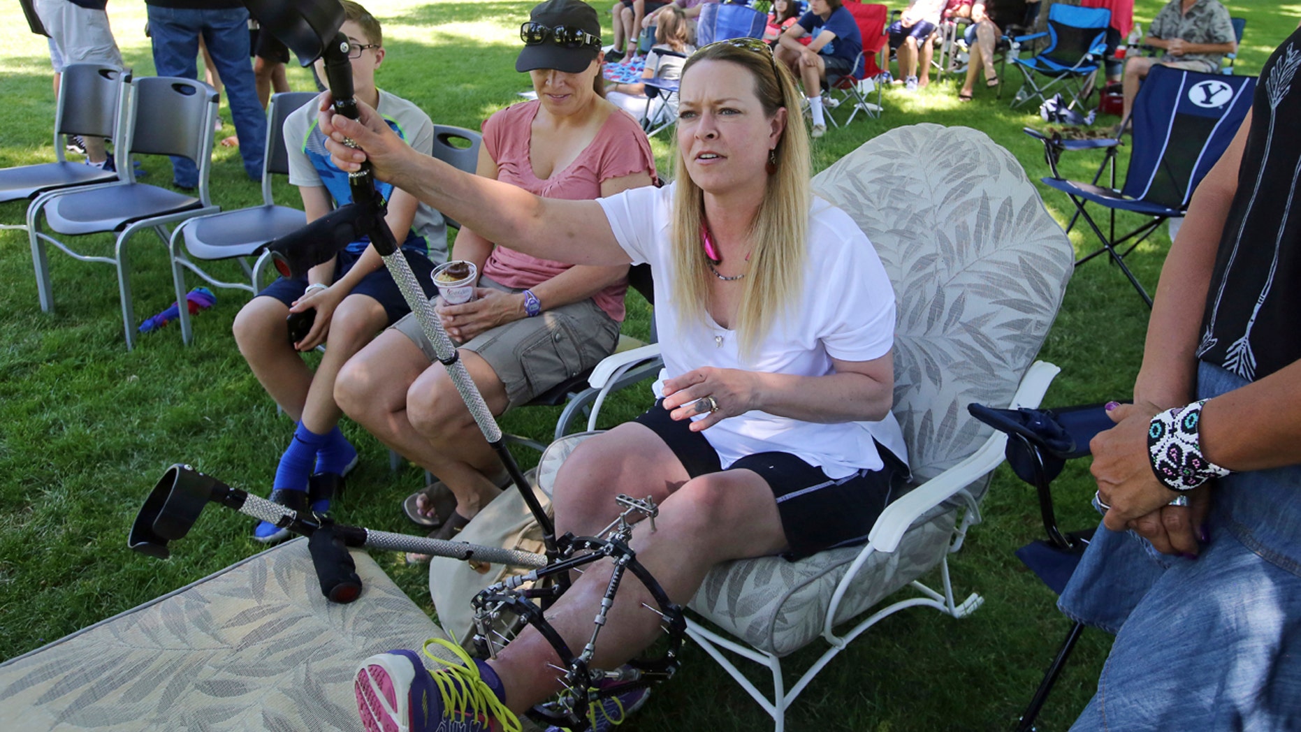 Melissa Cochran, who was injured in the March 22 London terror attack, and whose husband Kurt Cohran was killed, attends a memorial concert Saturday, June 24, 2017, in Bountiful, Utah.