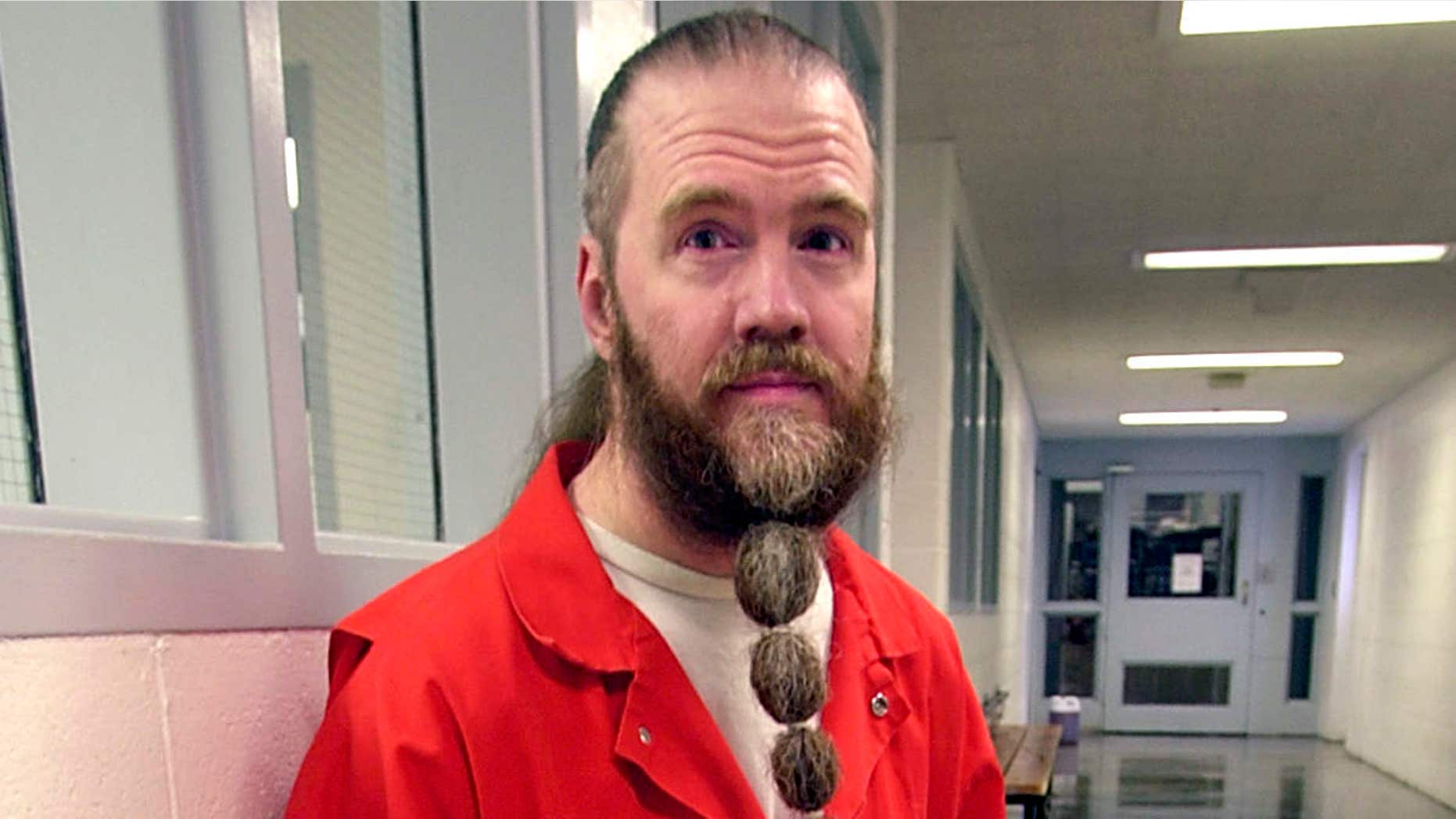 June 30, 2003: Dan Lafferty poses for a photograph, at Utah State Prison in Draper, Utah.