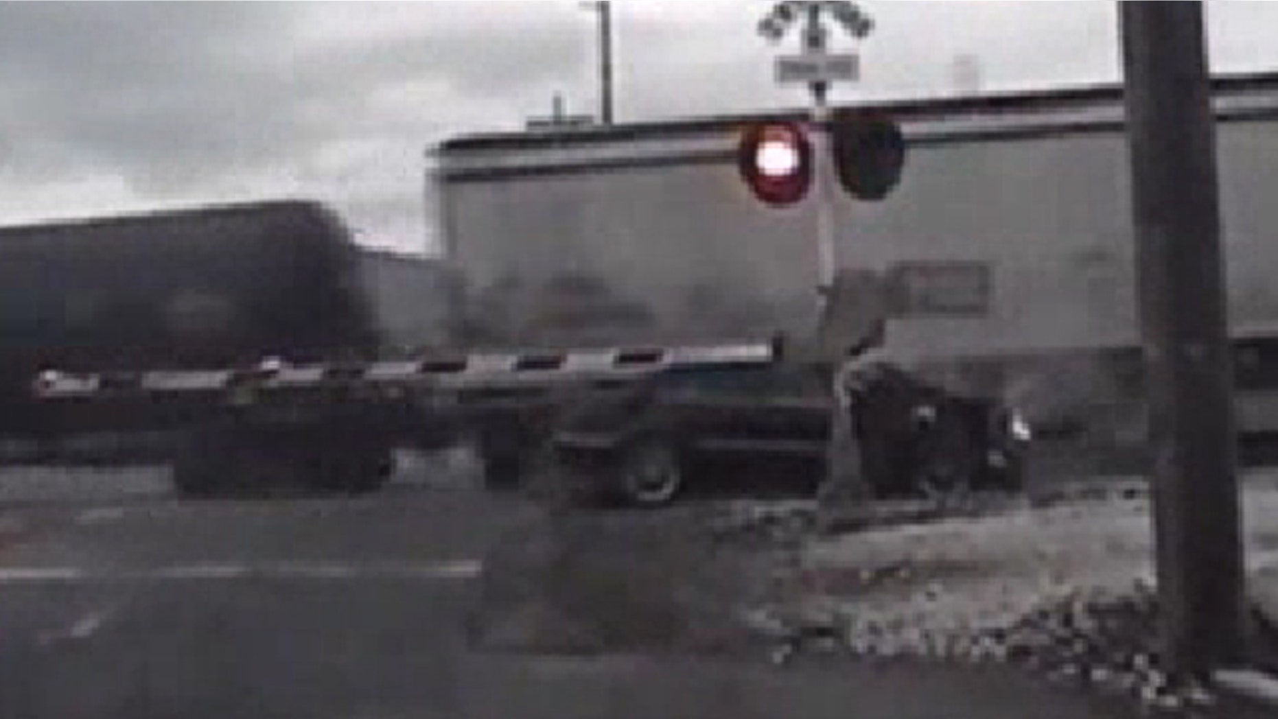 Oct. 15, 2013: Authorities say a woman who was trying to evade police was injured when the car she was driving crashed into a train and then was struck by a second train.
