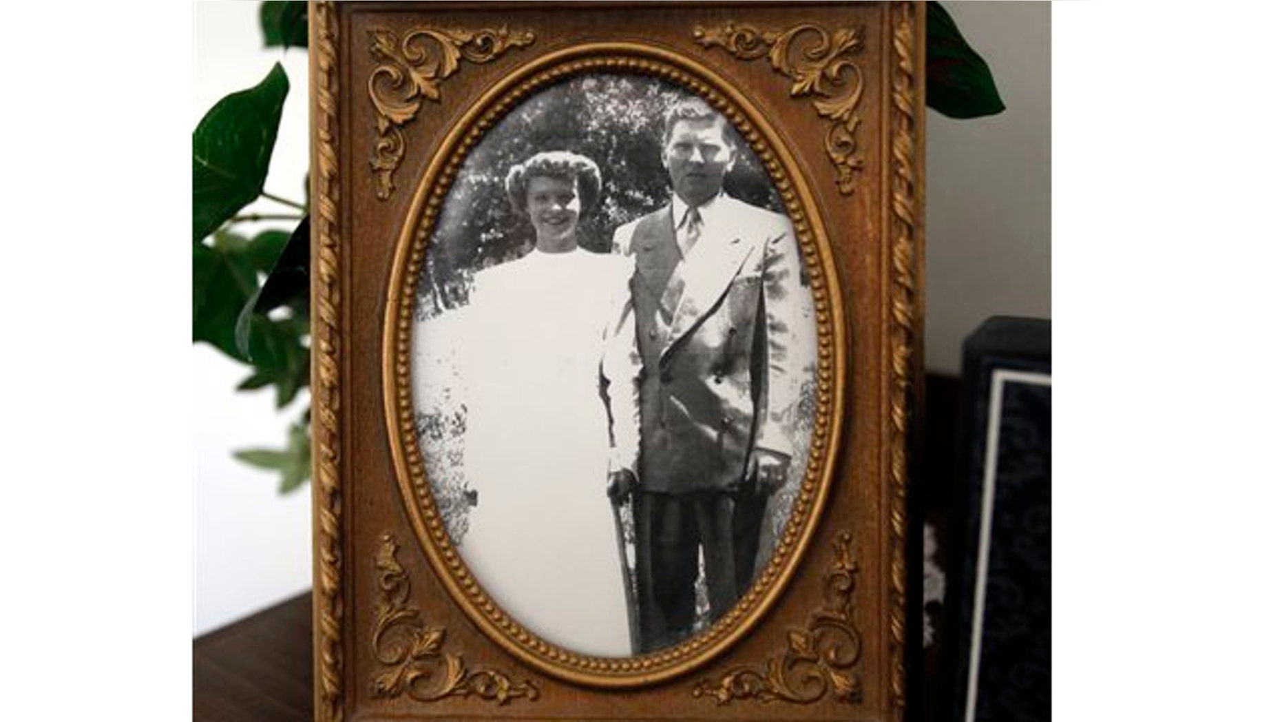 Oct. 7, 2013: A photograph of Jerry and Edith Dunn is displayed in their home in Spanish Fork, Utah. The couple lived 63 years together, died within hours of each other last week.