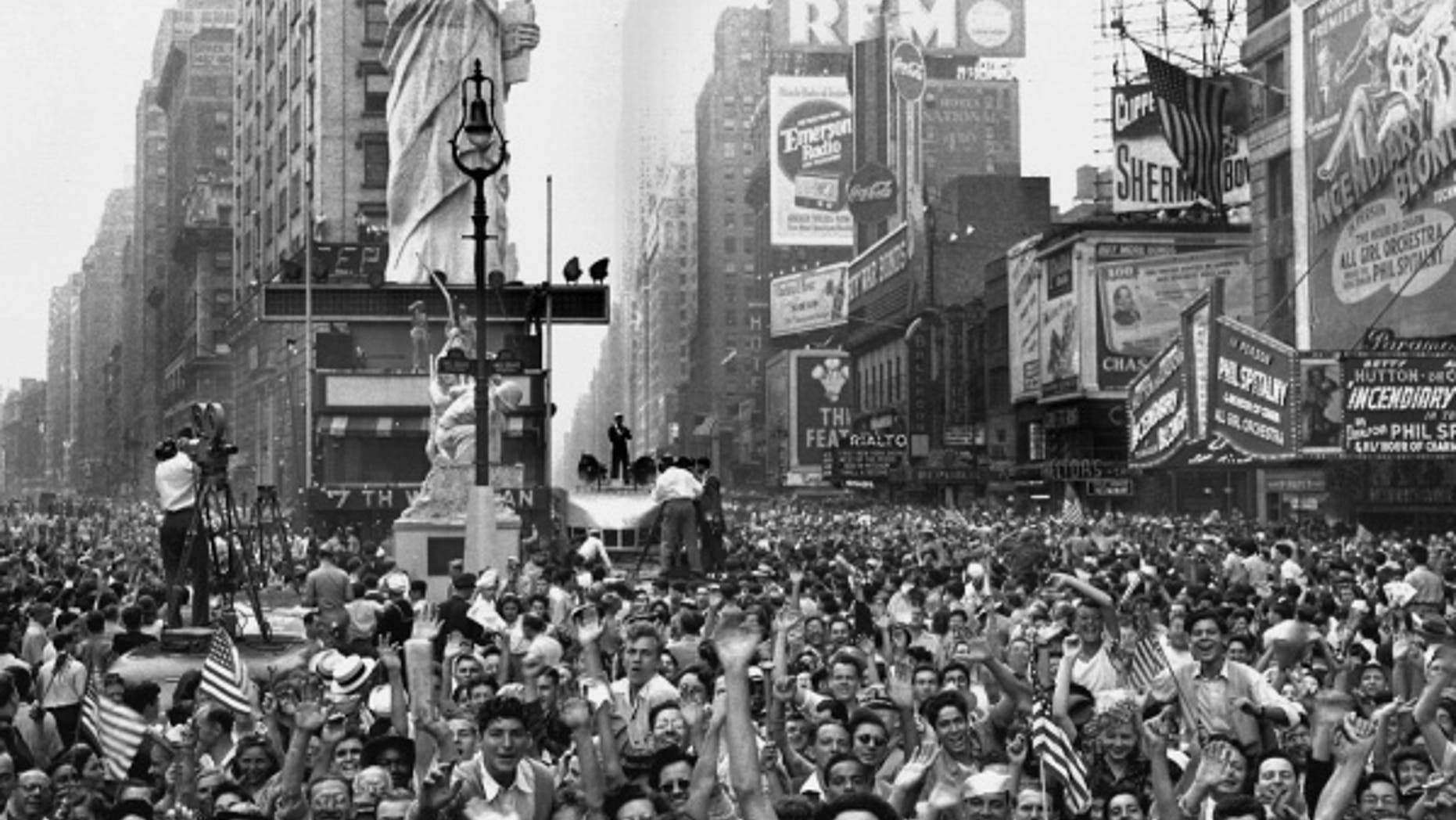 FILE -- Thousands of people celebrate VJ Day on New York's Times Square August 14, 1945 after Japanese radio reported acceptance of the Potsdam declaration.
