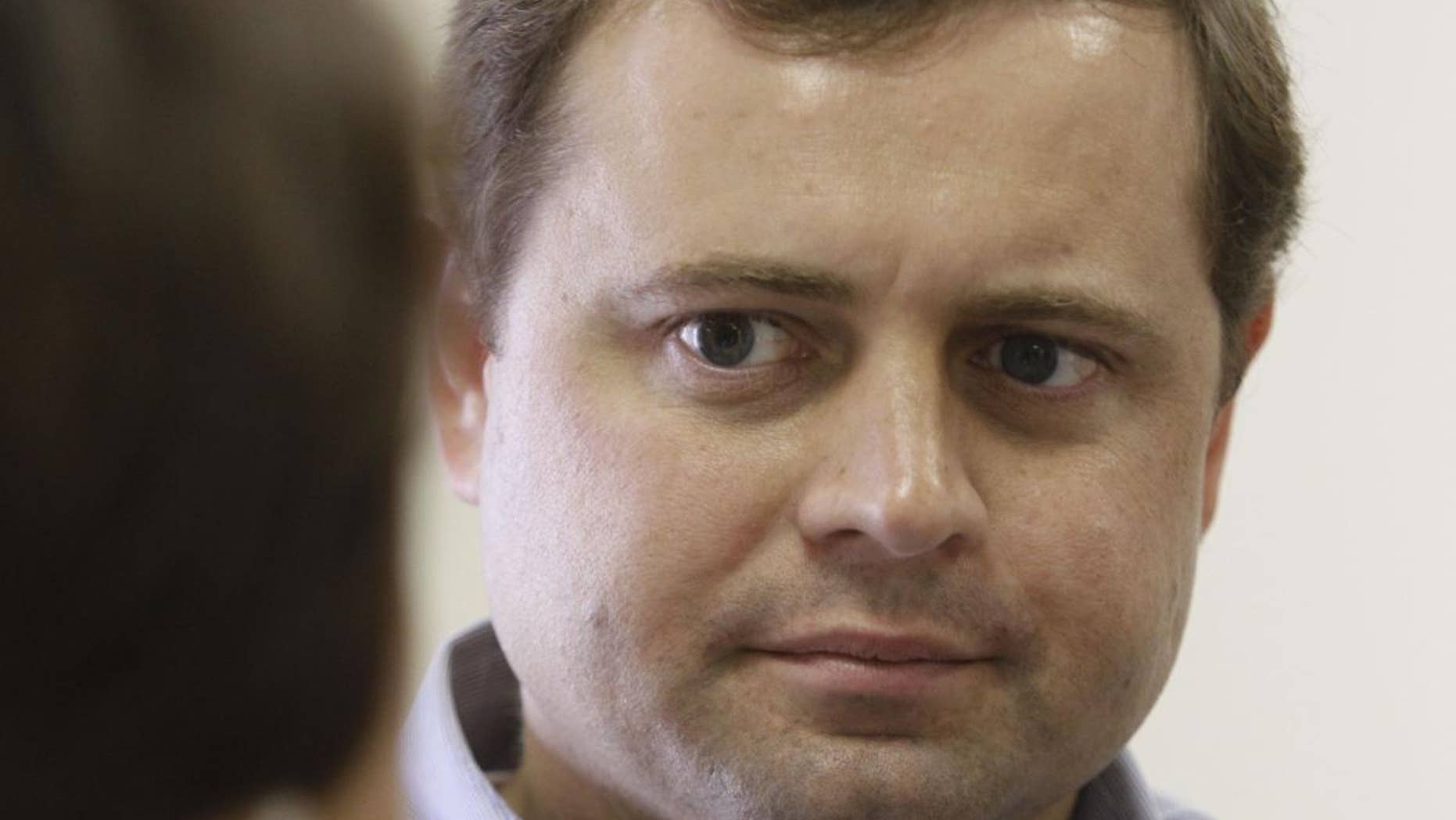 Virginia Congressman Tom Perriello talks with Charlotte Wilson, left, during a walking tour of downtown Chase City, Va. (AP Photo/File)