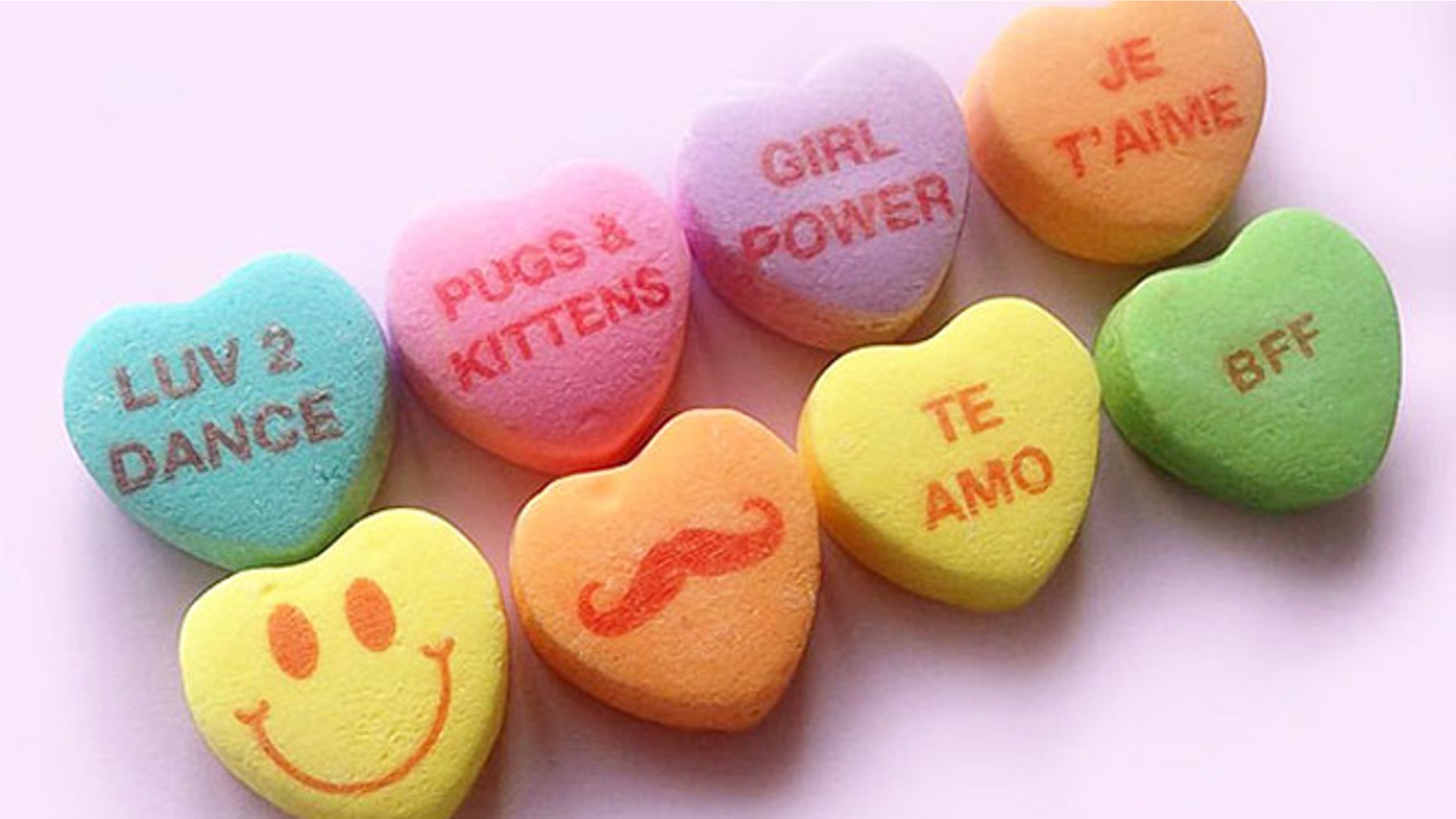 New candy heart phrases Te Amo, Pugs & Kittens, BFF and a mustached emojii.