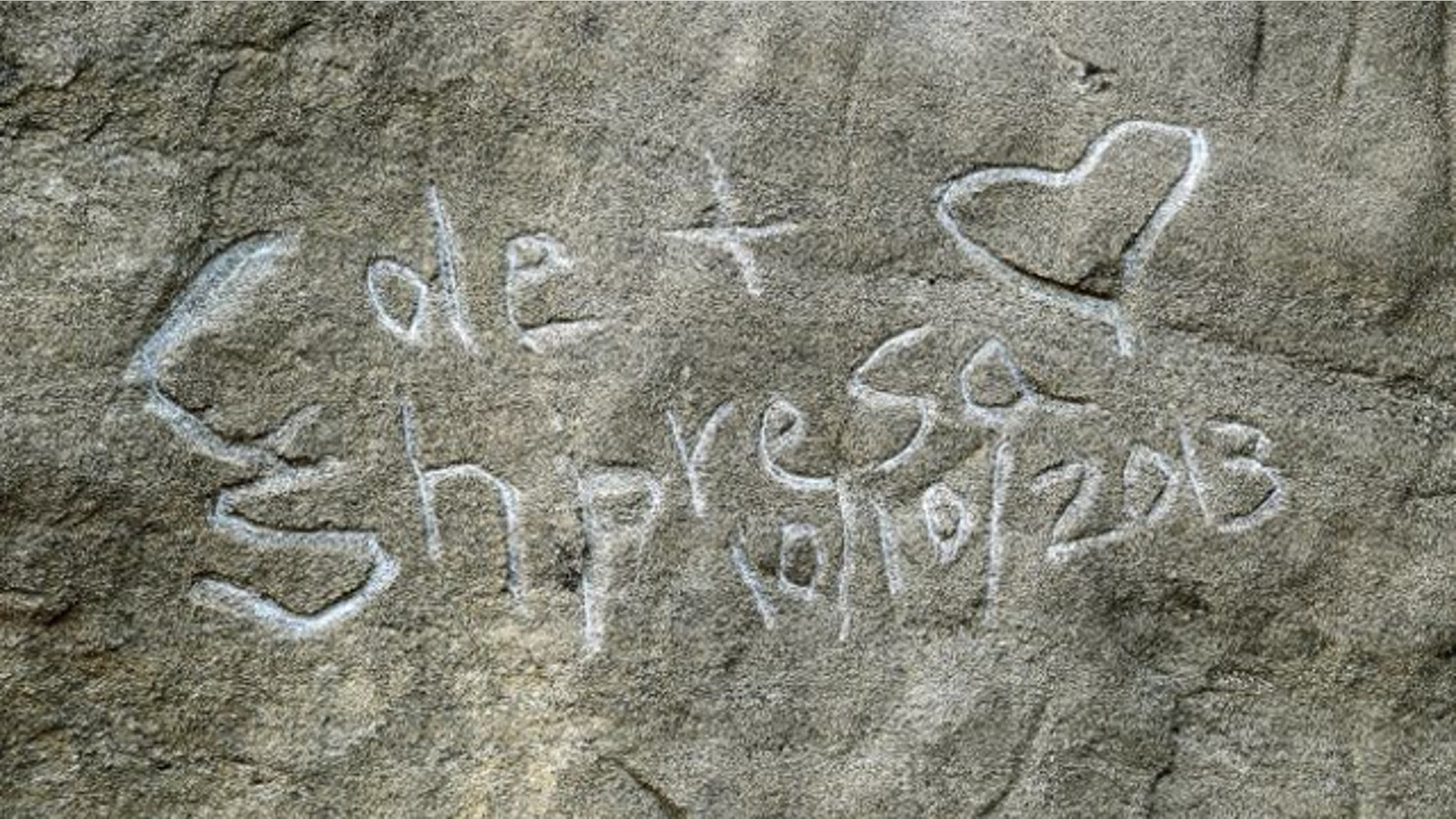Oct.. 31, 2013: Graffito spelling "Cole & Shpresa 10/10/2013" is seen carved into the Pompeys Pillar National Monument in Montana.