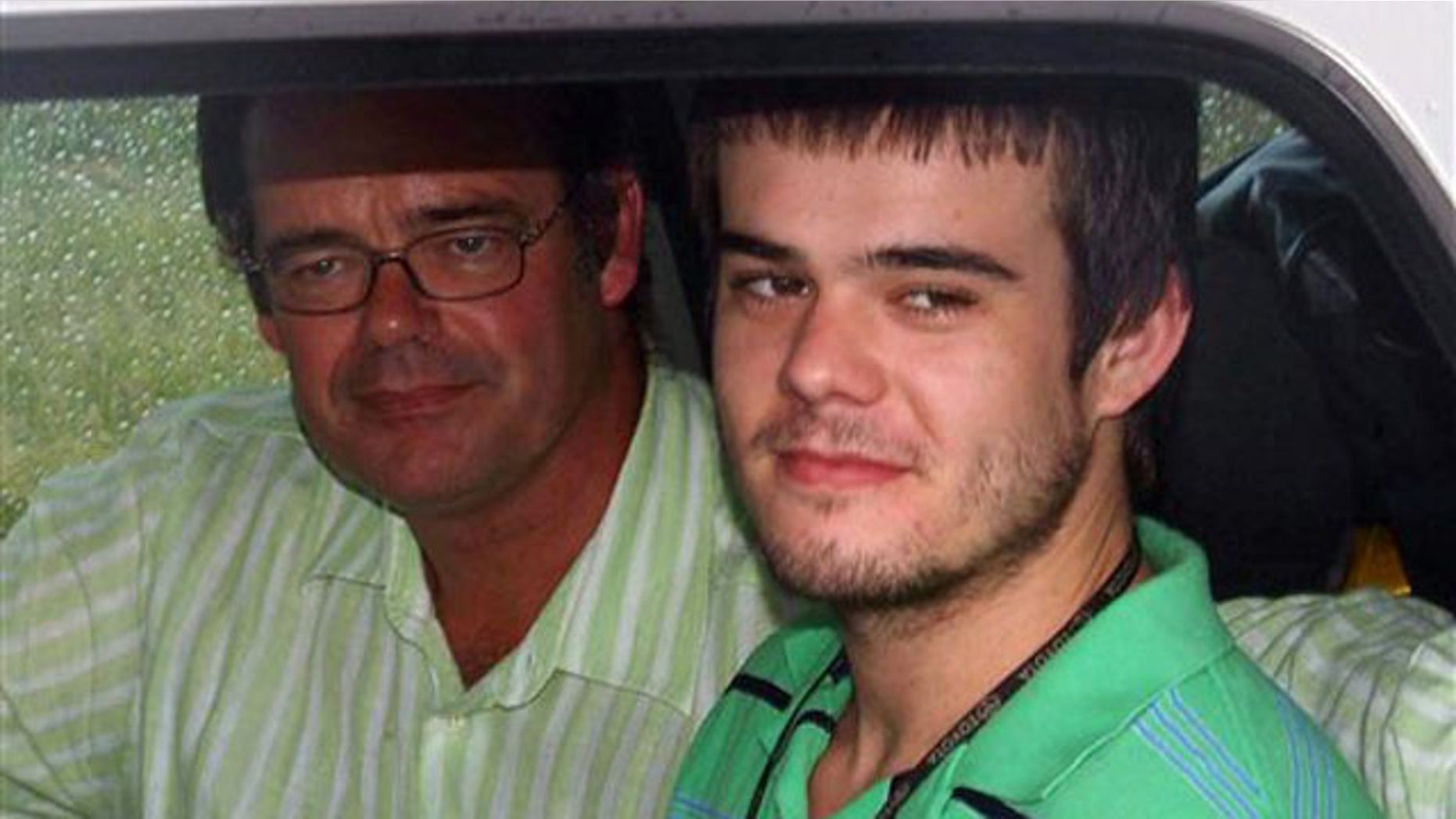 December 7, 2007 Joran van der Sloot, right, sits with his father, Paulus Van Der Sloot, after Joran after being released from custody near Oranjestad, Aruba. (AP)