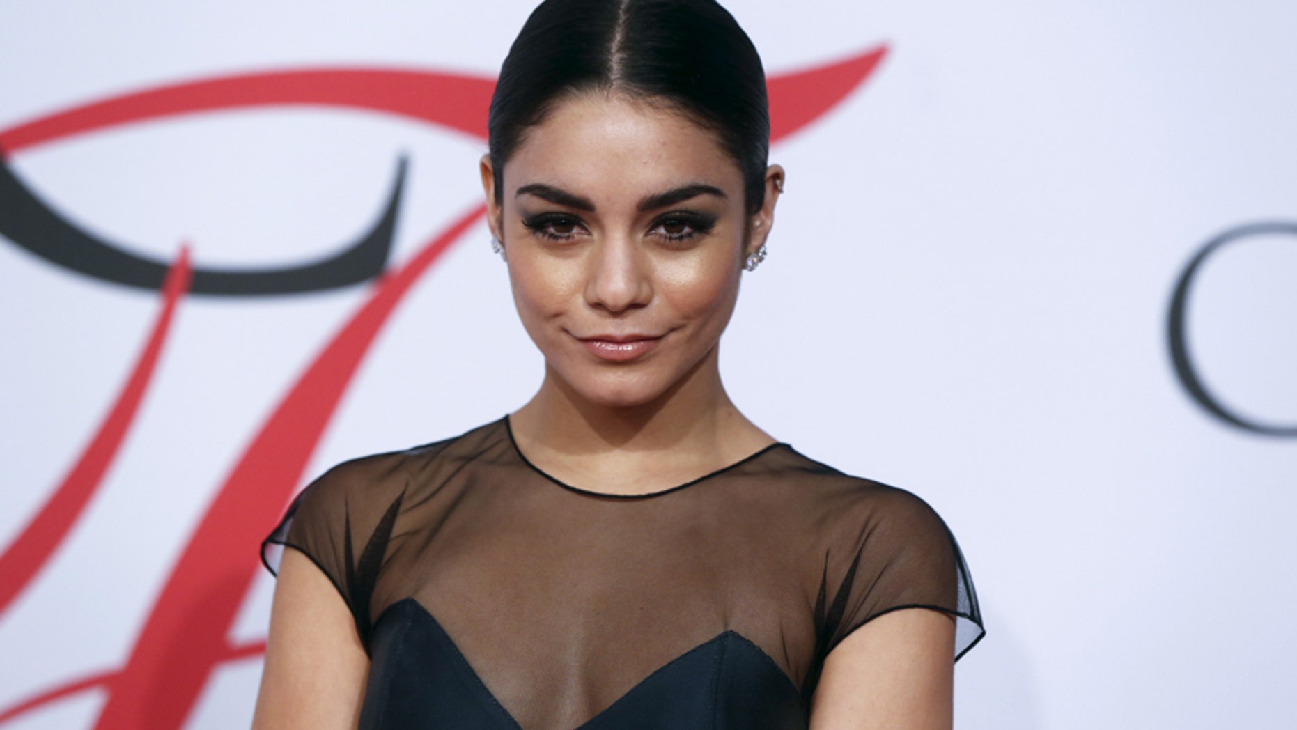 Singer Vanessa Hudgens arrives for the 2015 CFDA Fashion Awards in New York.