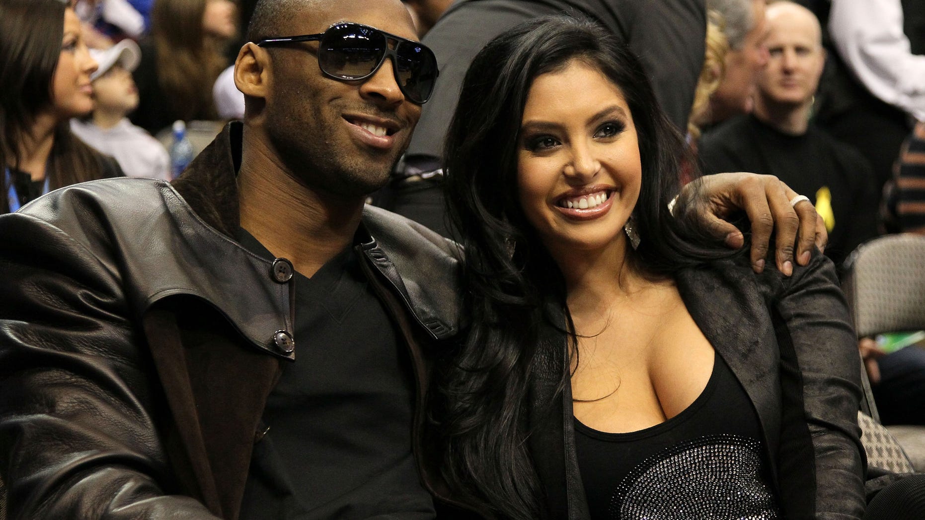 DALLAS - FEBRUARY 13: Kobe Bryant #24 of the Los Angeles Lakers smiles with his wife Vanessa Lynne during the Taco Bell Skills Challenge on All-Star Saturday Night, part of 2010 NBA All-Star Weekend at American Airlines Center on February 13, 2010 in Dallas, Texas. NOTE TO USER: User expressly acknowledges and agrees that, by downloading and or using this photograph, User is consenting to the terms and conditions of the Getty Images License Agreement. (Photo by Jed Jacobsohn/Getty Images)