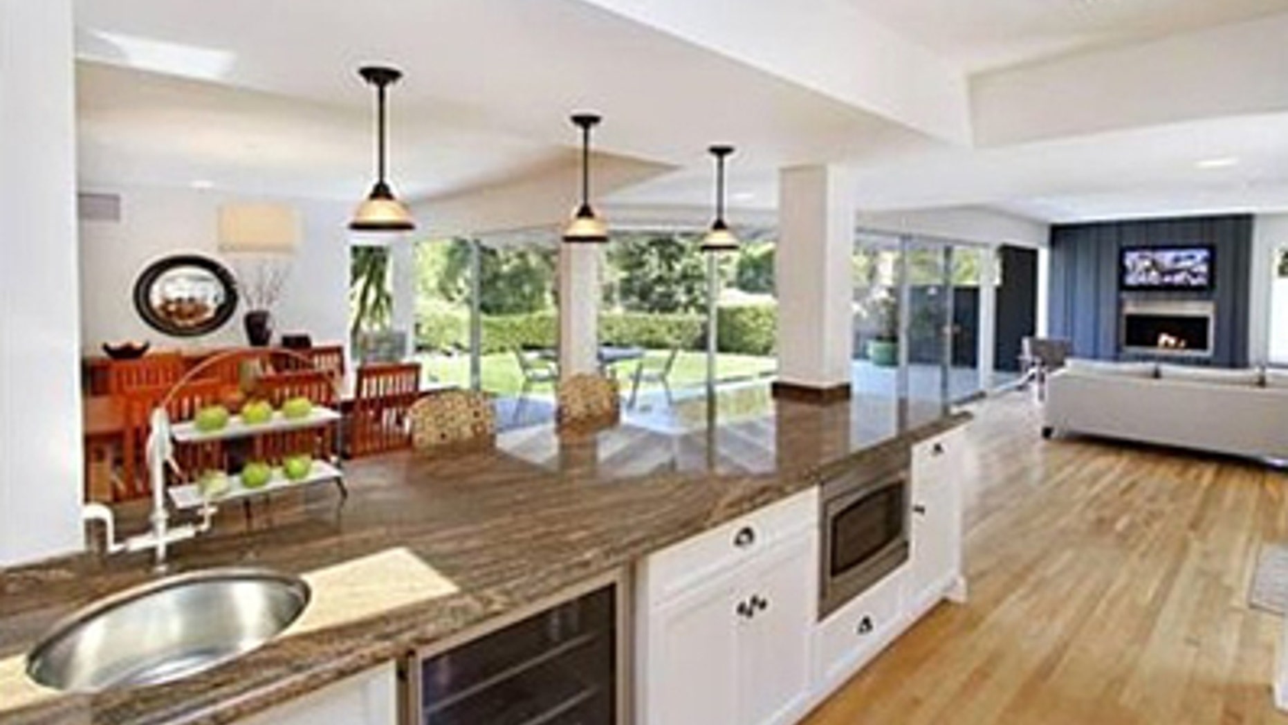 Great room combines the dining room, living and family room in one open space.